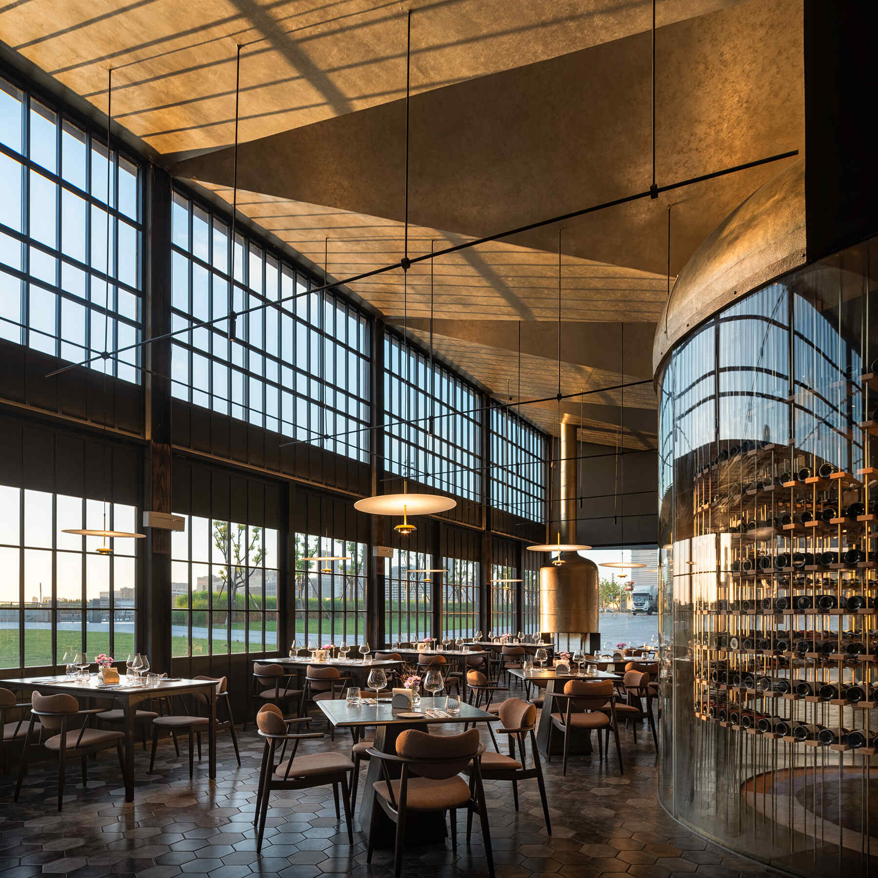This project transforms a former industrial "white box" exhibition hall into a Michelin-level restaurant through a strategy of dialogue rather than coverage. 
