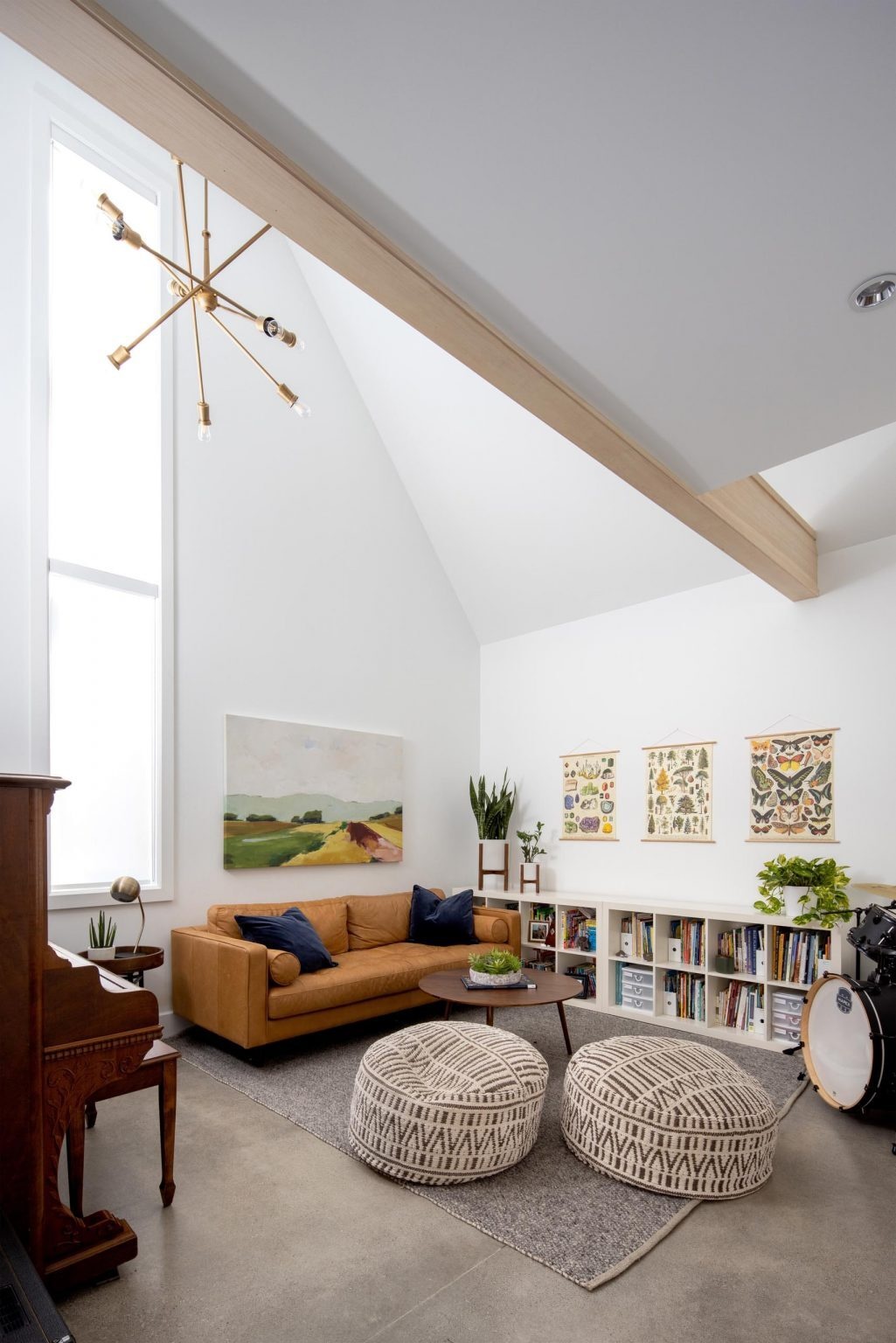 A secondary living room that also functions as a music space adds flexibility and personality to this Scandinavian-inspired family home.