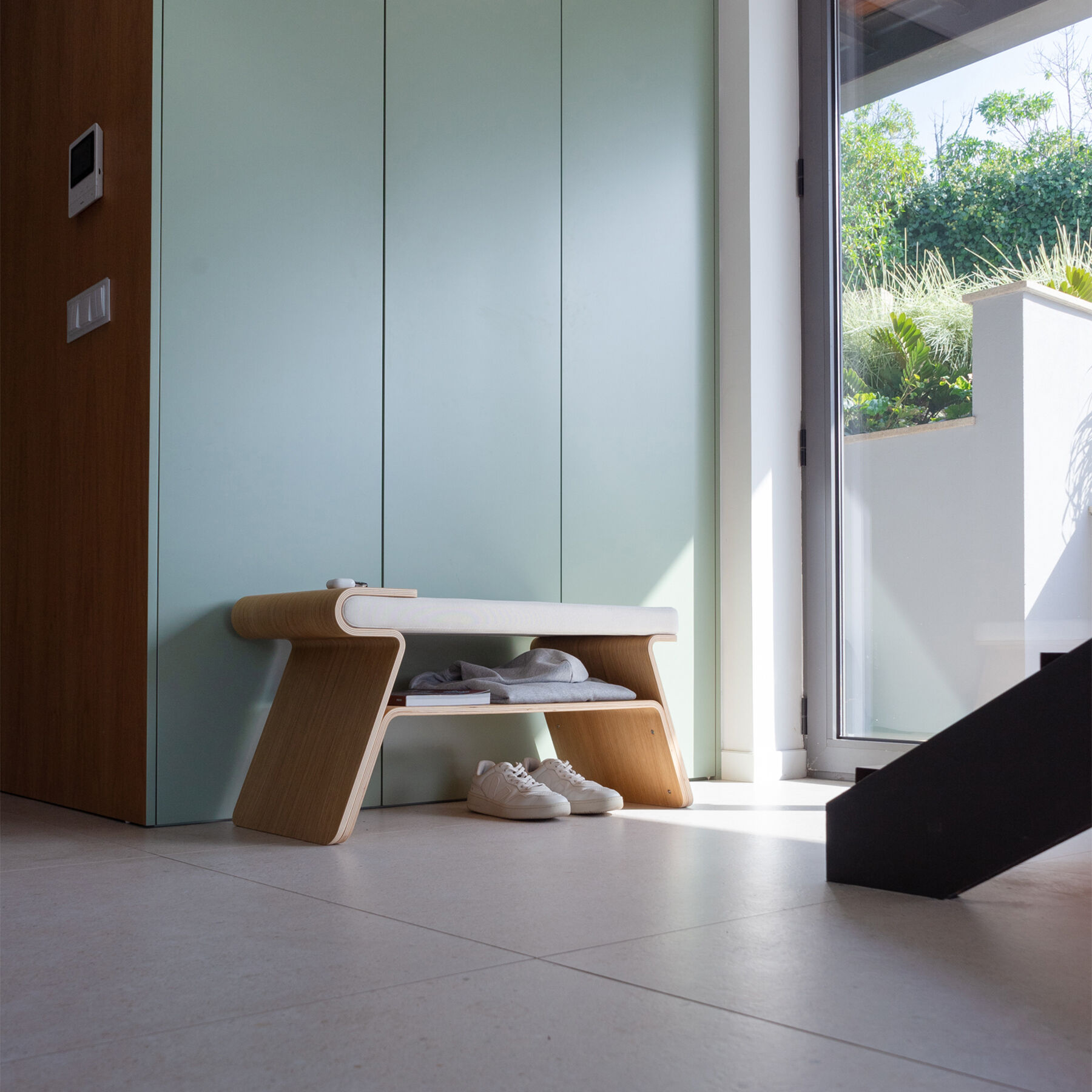 Rooted in human behavior, Tokyo is inspired by the Japanese custom of removing shoes before entering homes. This piece crosses cultural tradition with modern home needs, reimagining a daily object through an updated lens to suit fast paced lifestyles. Visually influenced by Japanese Torii gates, the design is distinguished by a balanced asymmetry where each component seamlessly flows with aesthetic and functional purpose.