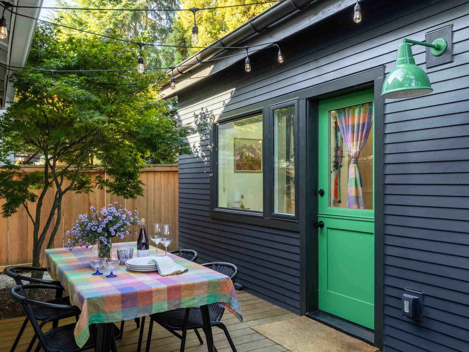 This backyard studio borrows ideas from Scandinavian ski chalets, combining white oak cabinetry, bright interiors, and clever space planning in just 180 square feet.