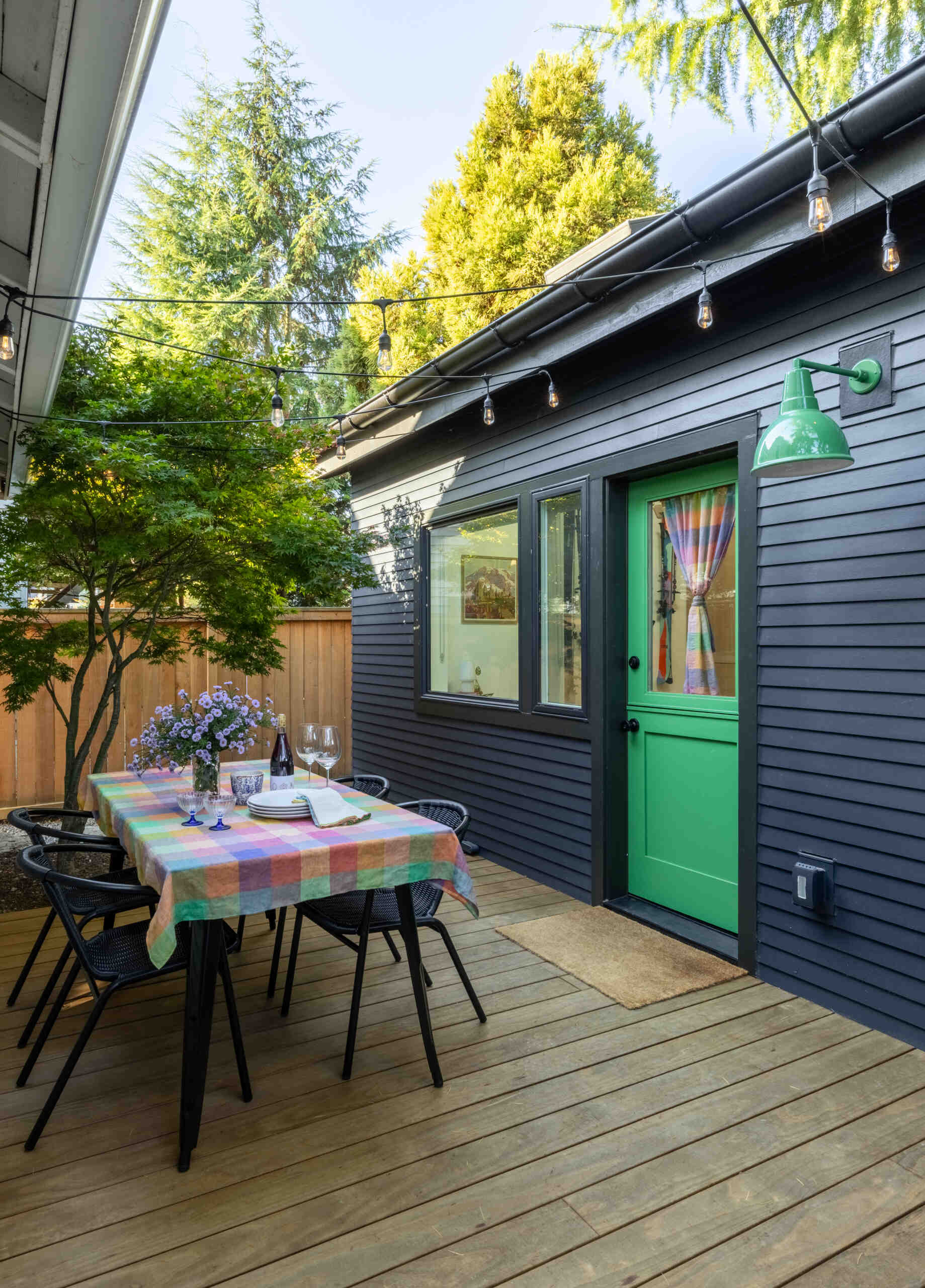 This backyard studio borrows ideas from Scandinavian ski chalets, combining white oak cabinetry, bright interiors, and clever space planning in just 180 square feet.