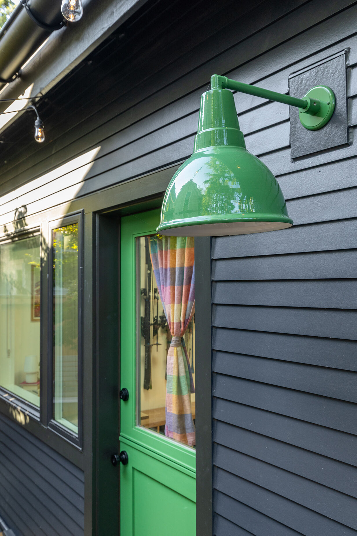 This backyard studio borrows ideas from Scandinavian ski chalets, combining white oak cabinetry, bright interiors, and clever space planning in just 180 square feet.