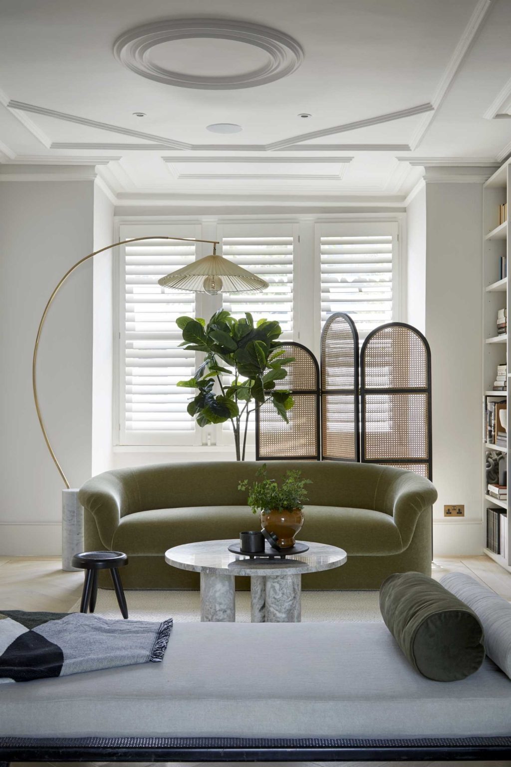 A wood-framed doorway links the bright contemporary extension to the original Victorian interiors, creating a beautiful contrast between old and new.