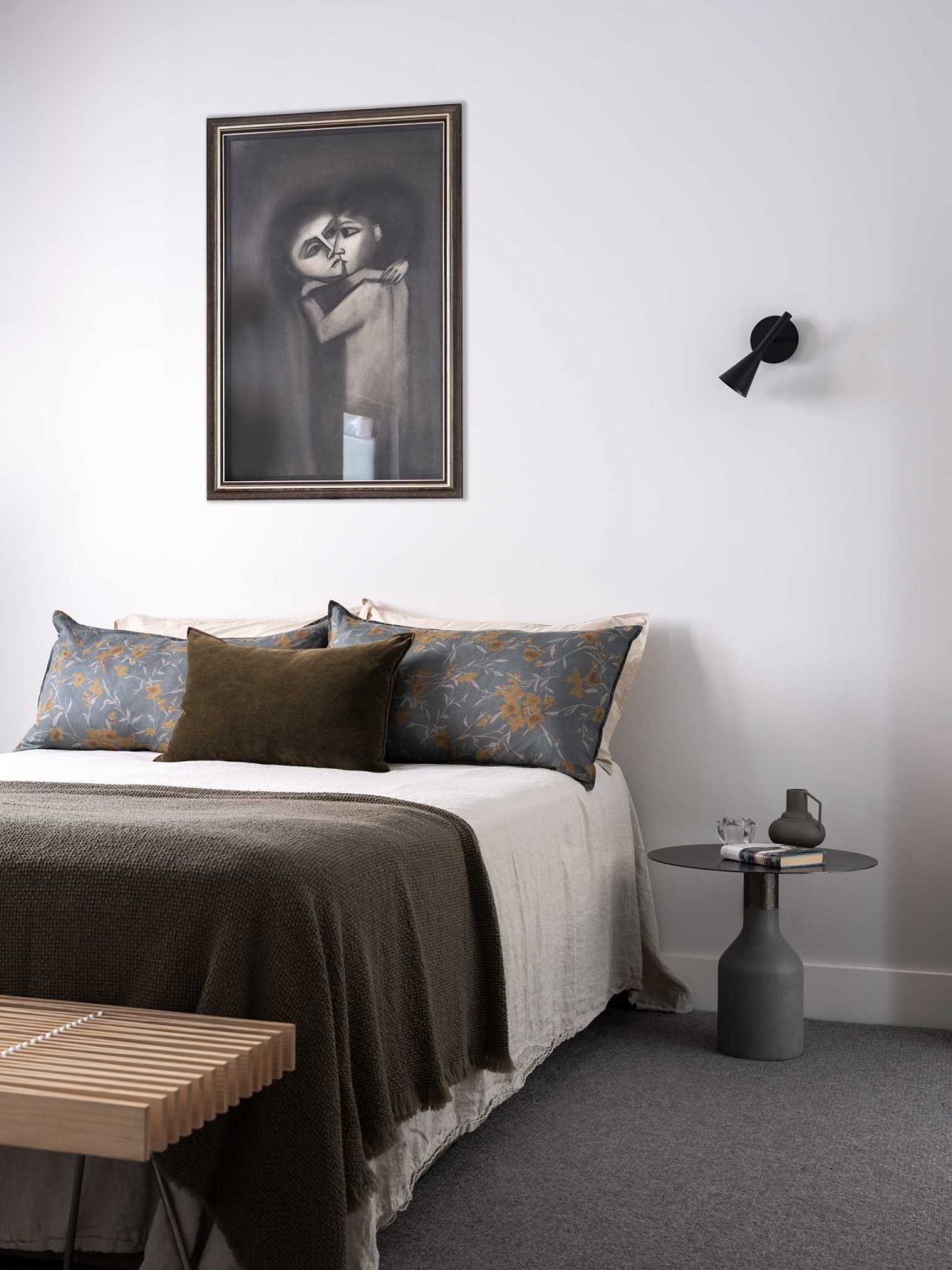 Contemporary bedrooms pair soft finishes with preserved original features that celebrate the home's history.