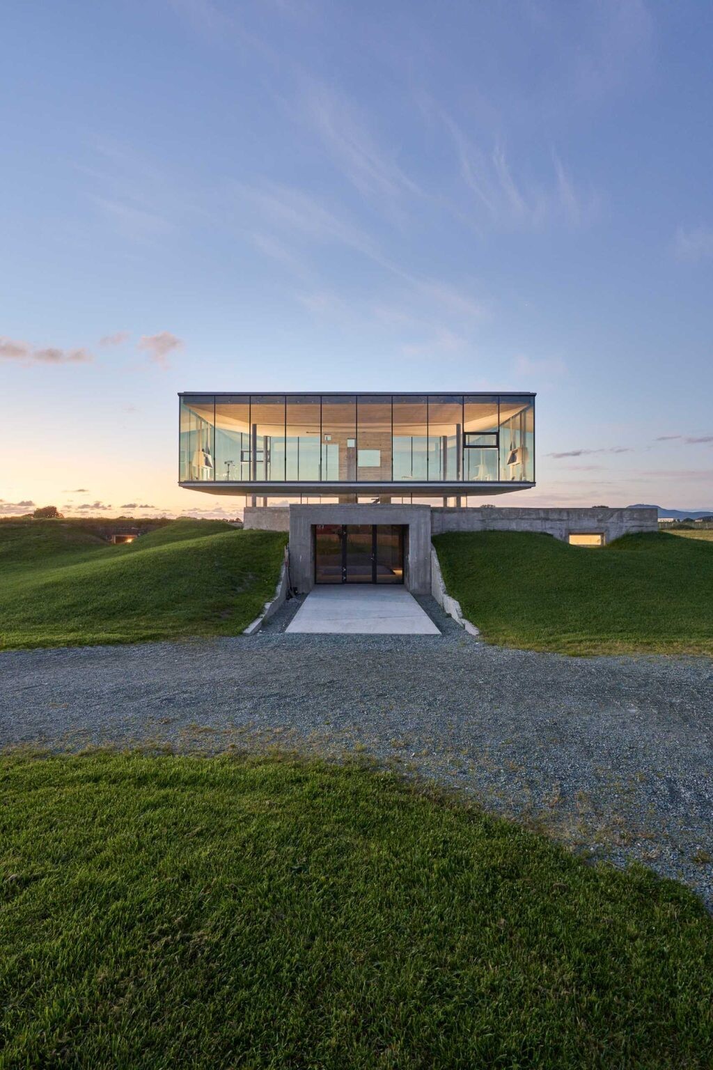 The original bunker entrance now leads to practical event spaces, including a kitchen, storage, and amenities that support everything from lectures to private celebrations.