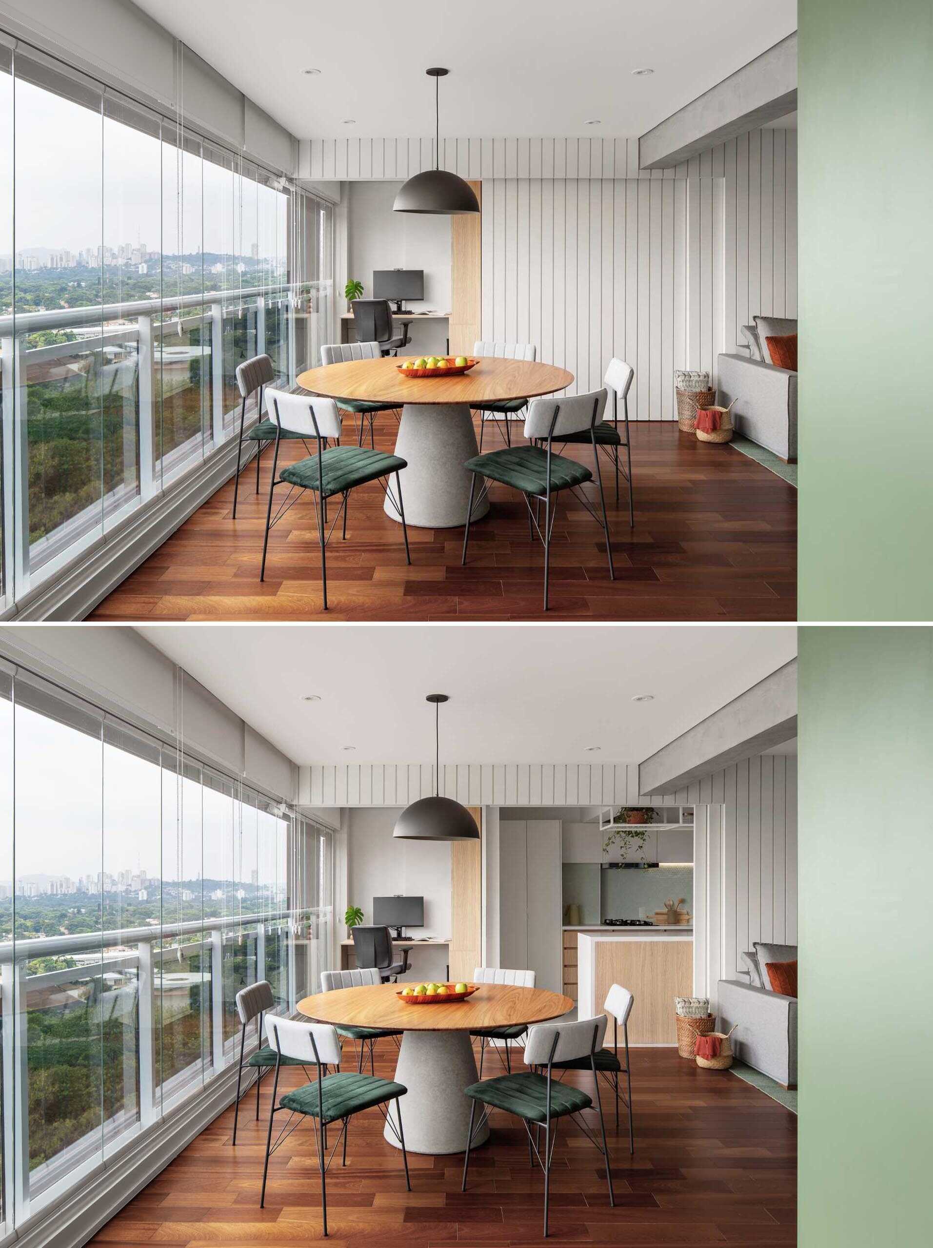 Discover how a striking white feature wall transforms this São Paulo apartment, hiding a home office and kitchen behind sleek sliding pocket doors while maintaining a clean, modern look.