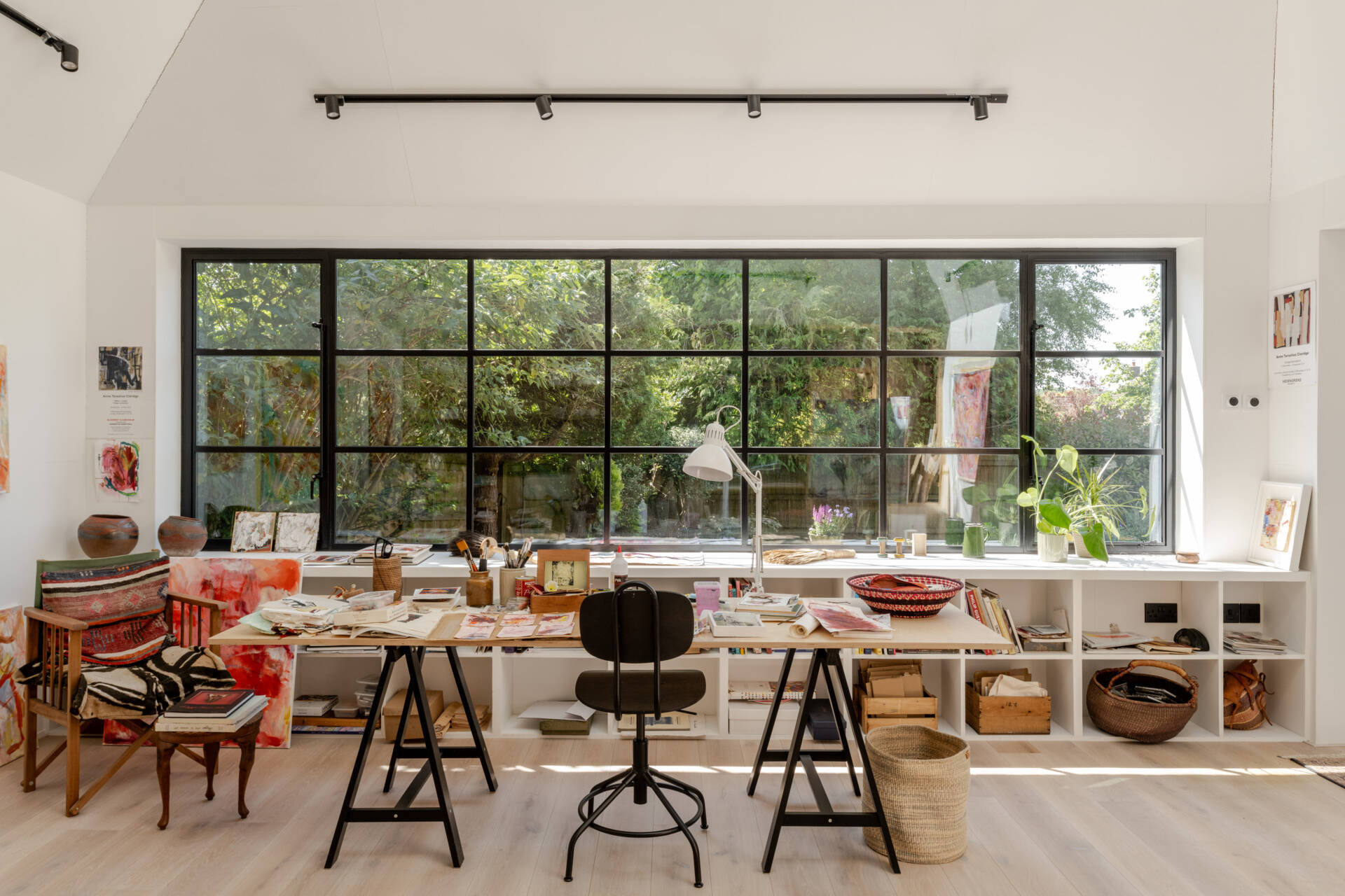 Hidden within a garden near Salisbury, this art studio features charred timber cladding, high-performance SIP construction, natural daylight, and low-impact foundations.