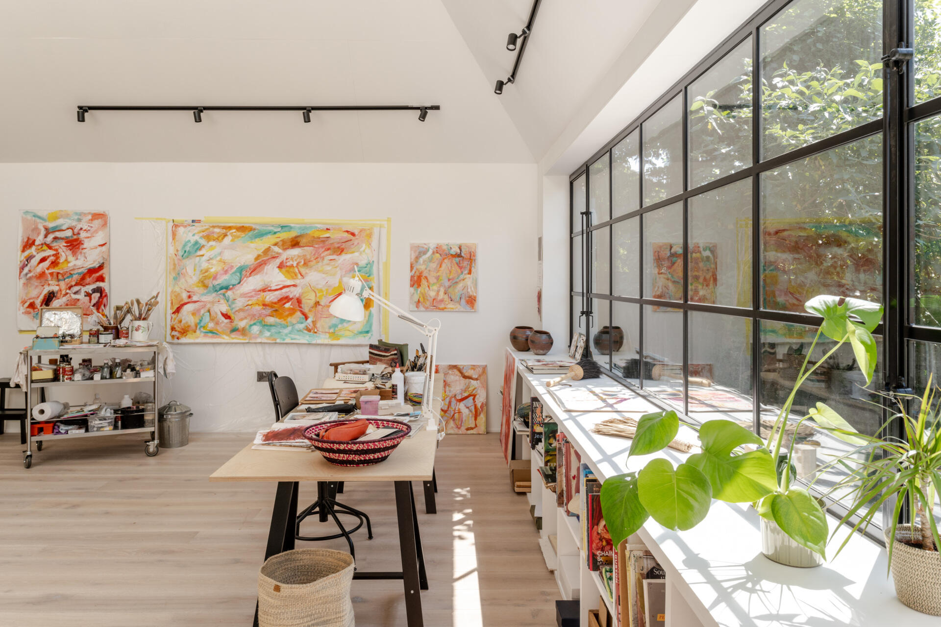 Hidden within a garden near Salisbury, this art studio features charred timber cladding, high-performance SIP construction, natural daylight, and low-impact foundations.