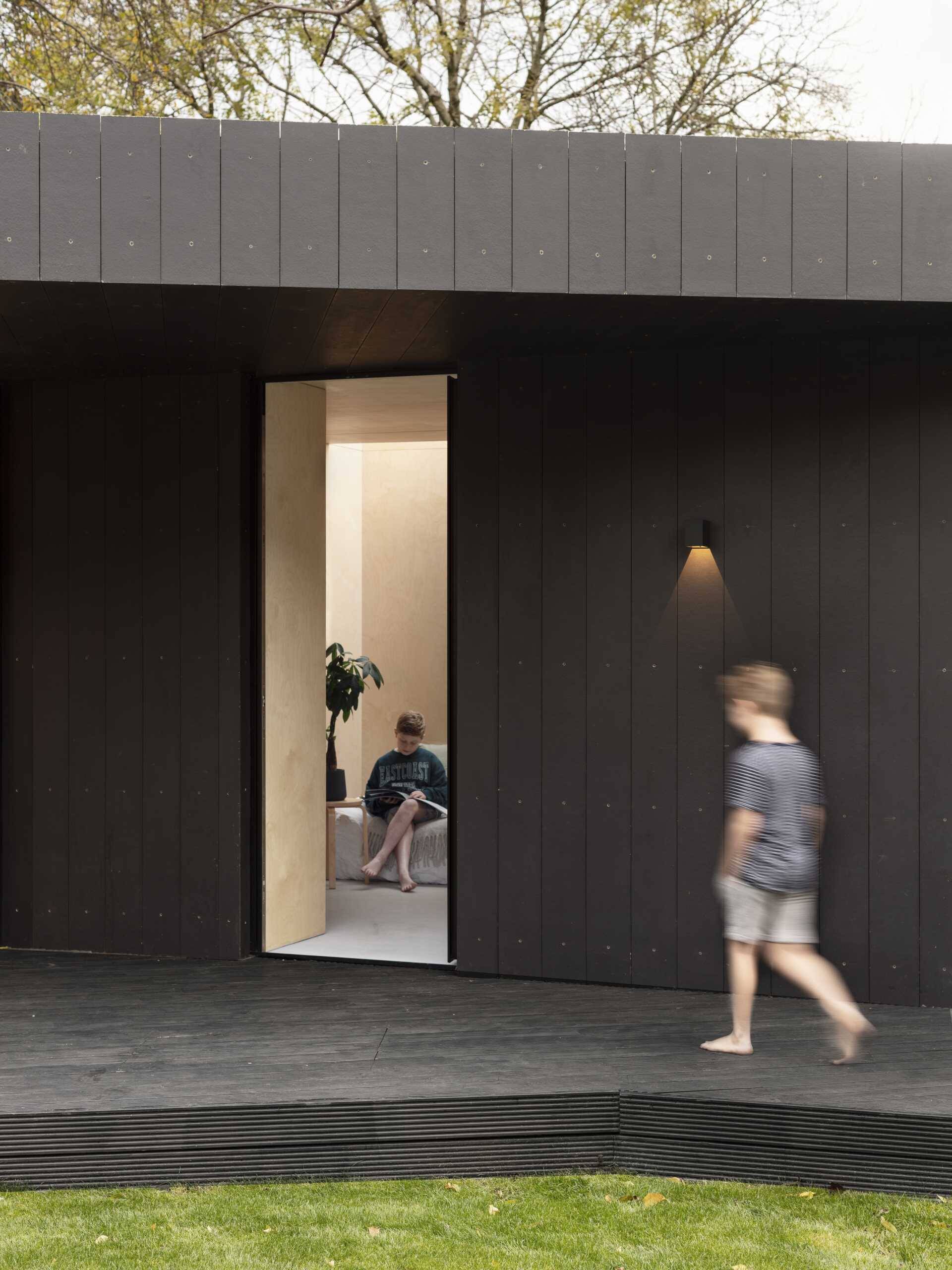 Inside this compact London studio, a working office, guest suite, and storage area fit together with impressive efficiency.