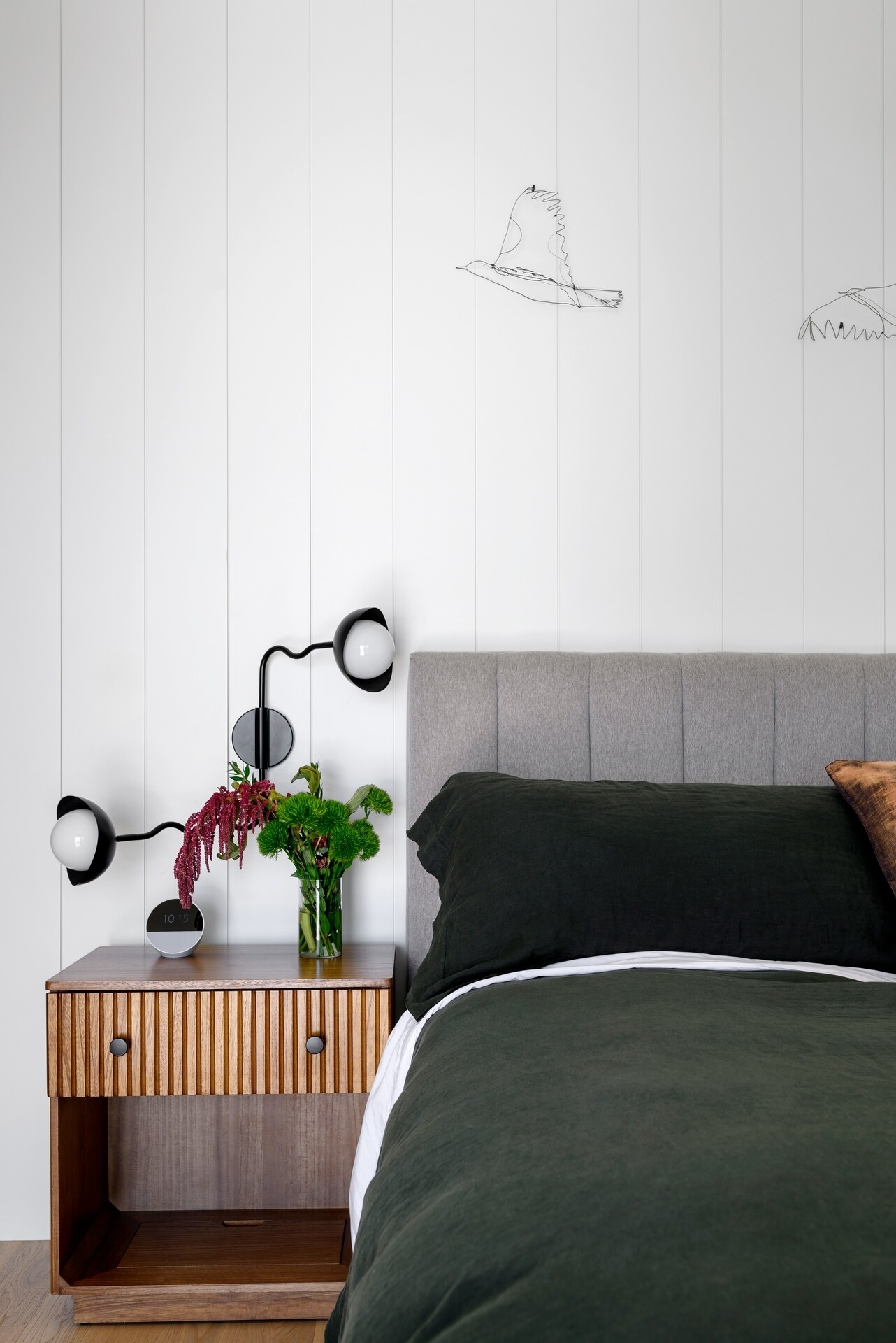 Explore the tranquil bedrooms at Lantern House, where soft textures, warm timber details, and stunning Puget Sound views create inviting spaces to unwind.