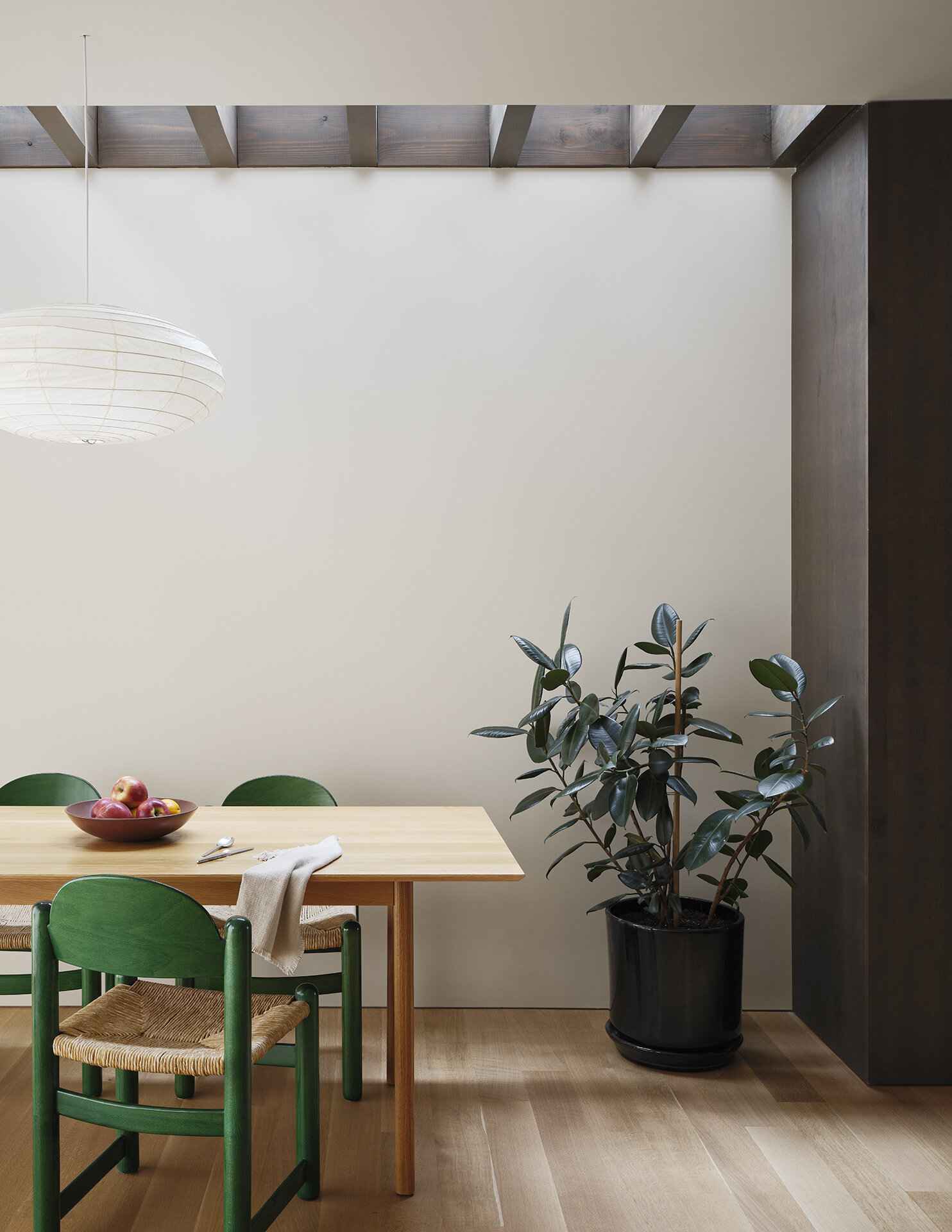Skylights flood this dining area with soft daylight, creating an ever-changing atmosphere throughout the year.