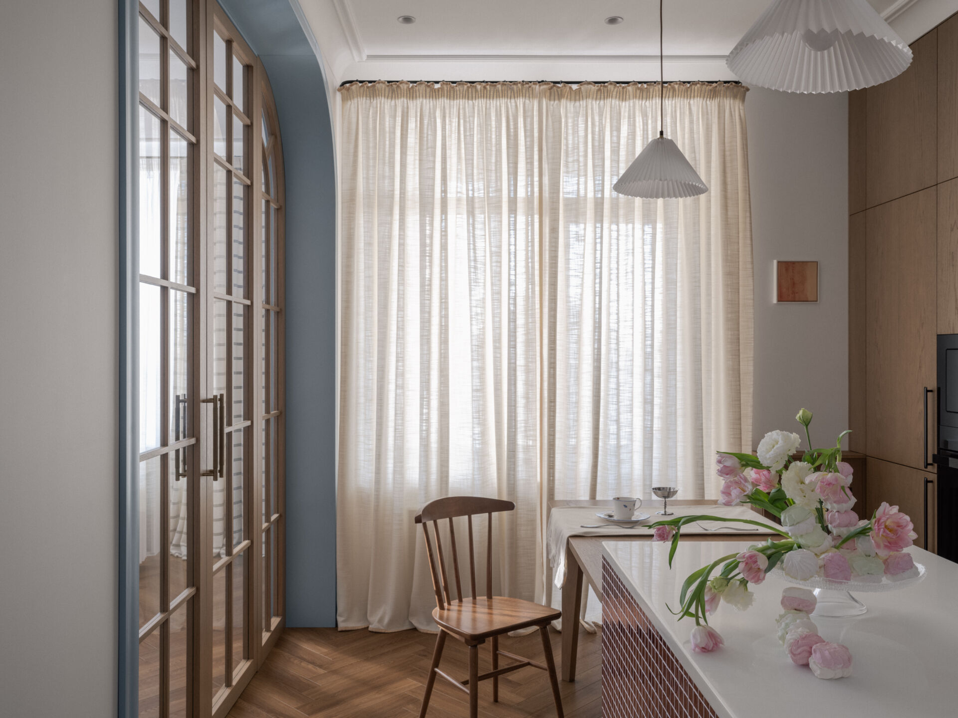 The dining and kitchen area balances practicality and warmth with subtle colors, open space, and a layout designed for everyday family life.