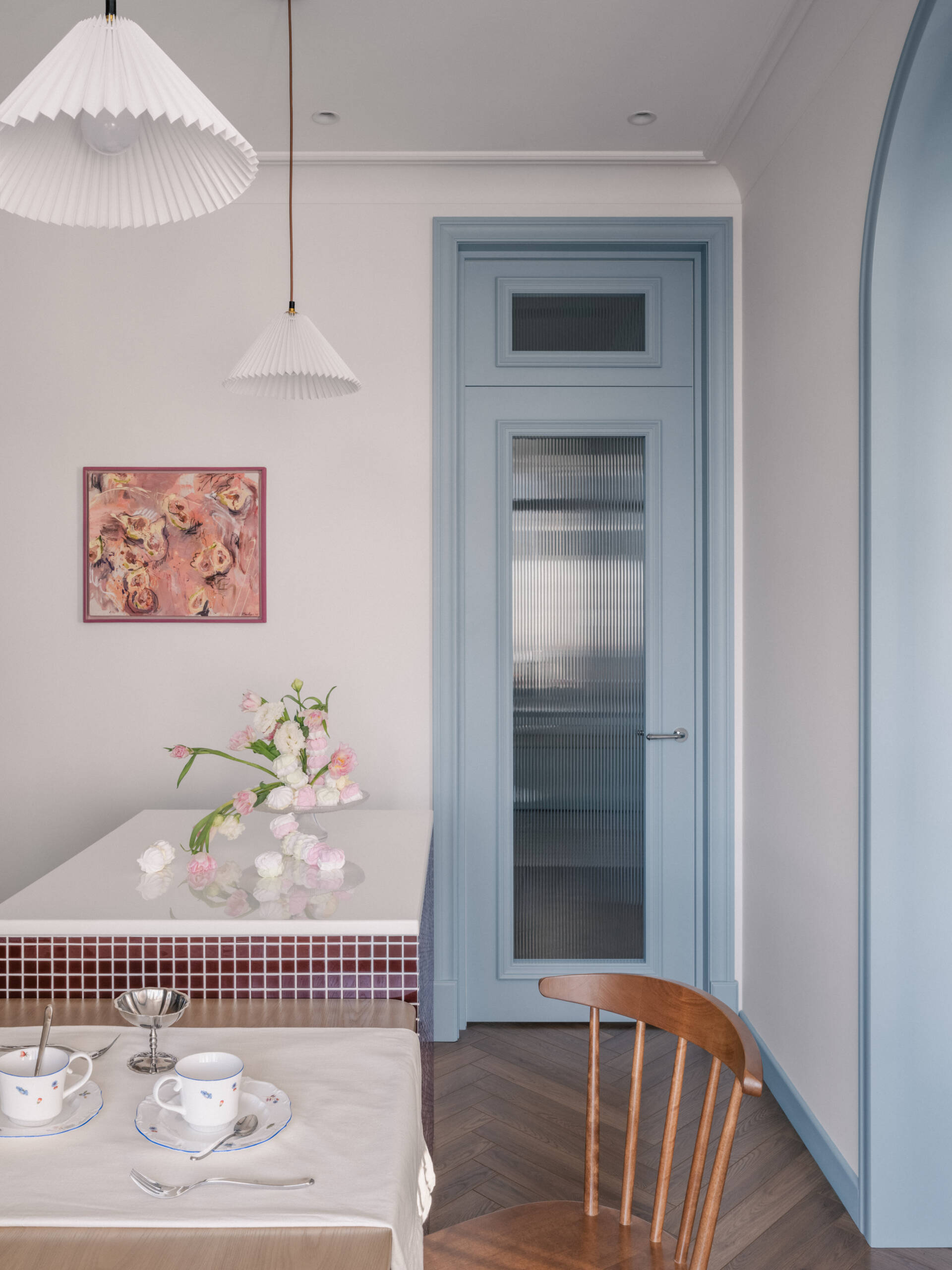 The dining and kitchen area balances practicality and warmth with subtle colors, open space, and a layout designed for everyday family life.