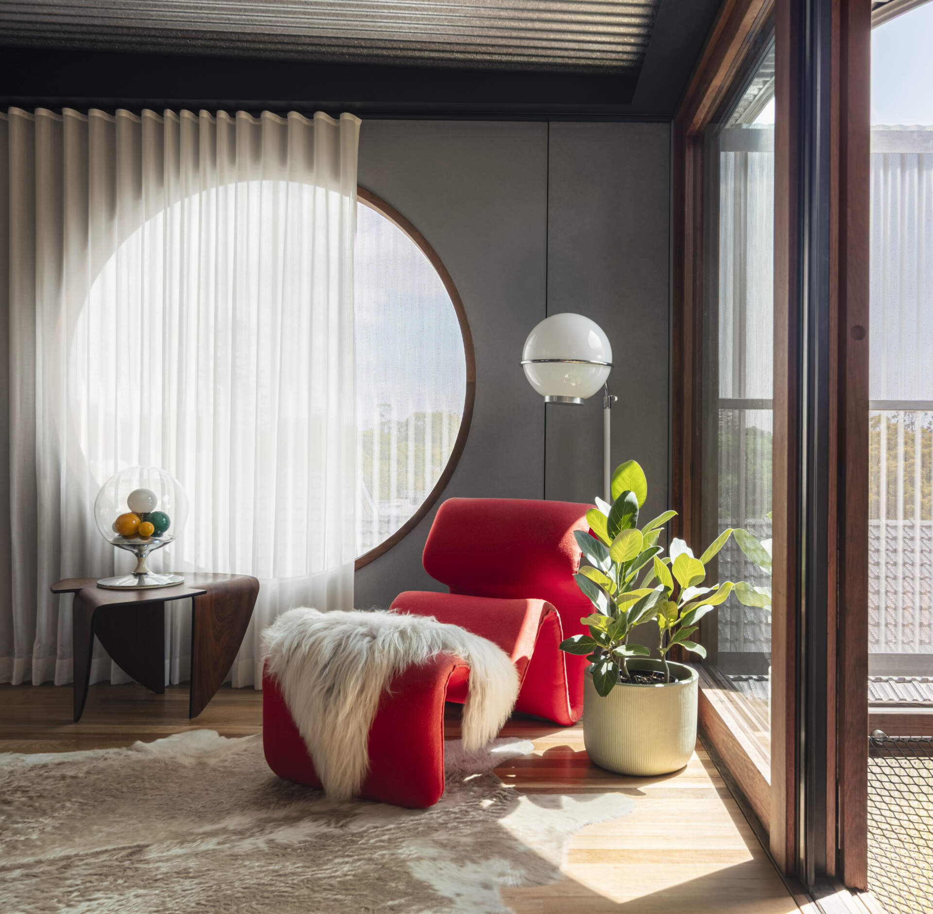 This bright home office doubles as a creative studio, offering flexible space for work, hobbies, and family activities.