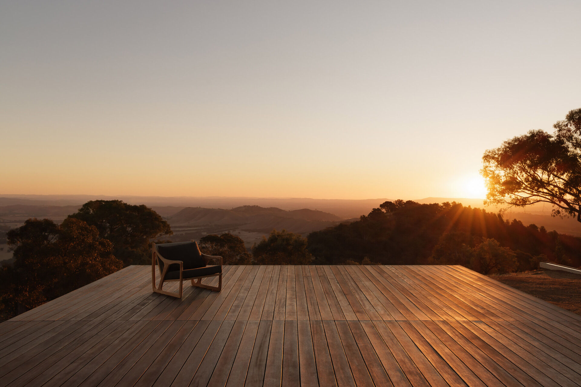 This elevated terrace projects into the landscape, offering panoramic views that stretch across the surrounding countryside and mountains.