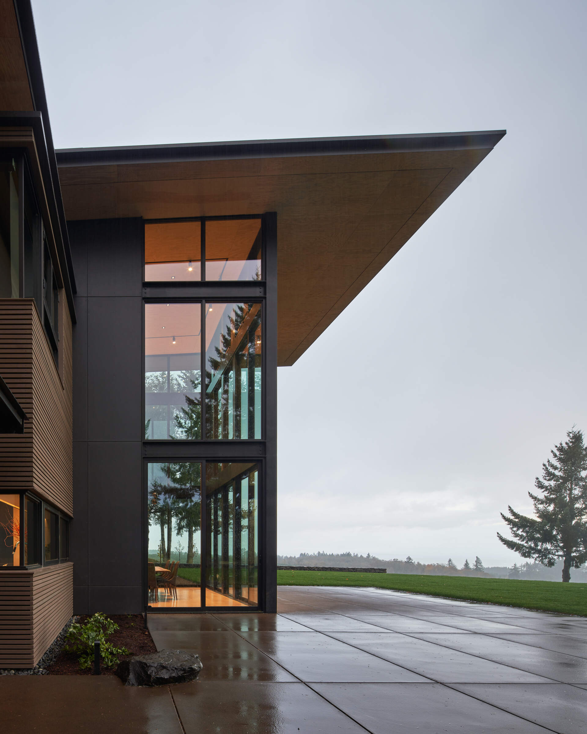 A modern dining room opens to a patio.