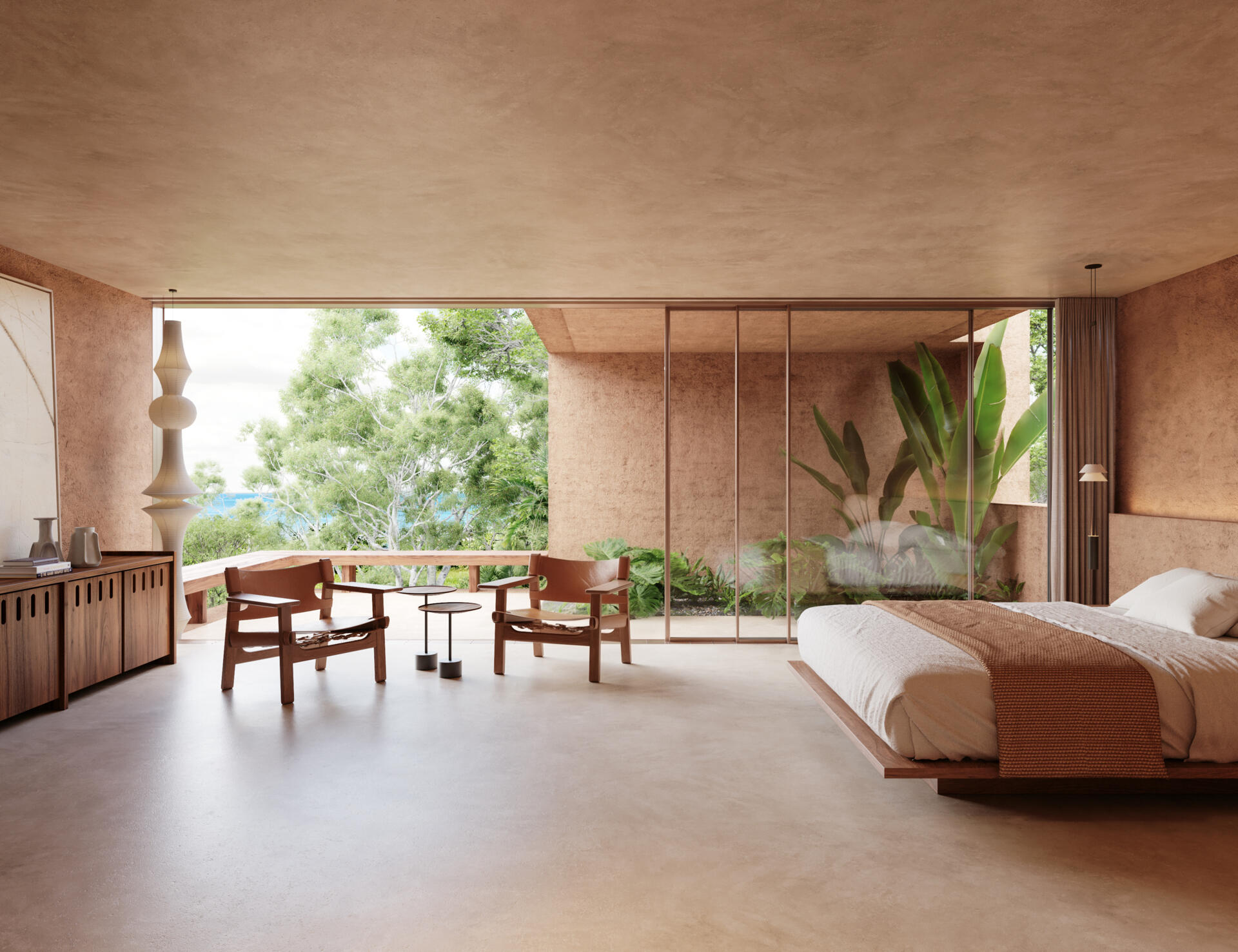 A modern bedroom with a sliding door that opens to an outdoor space.