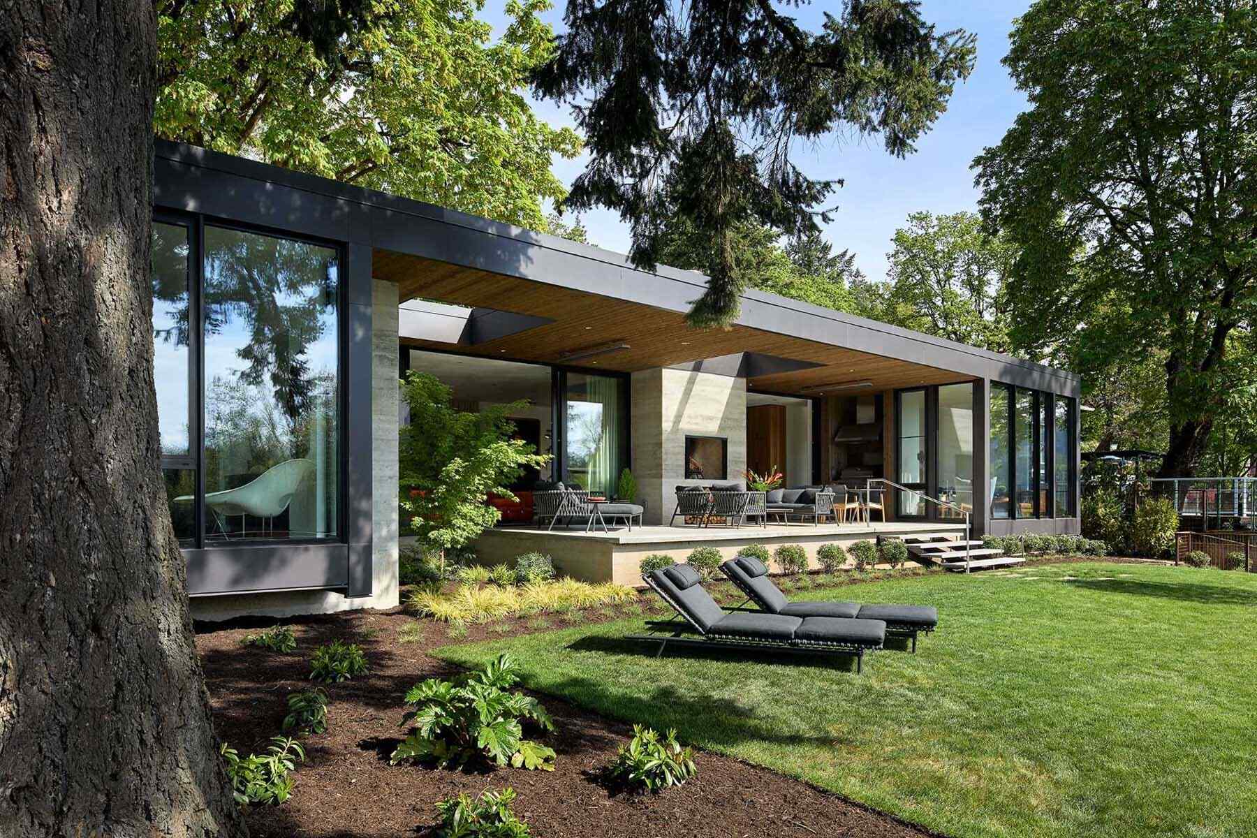 Explore a striking mix of cedar, aluminum, board-formed concrete, and glass in this contemporary Portland home designed for modern living.
