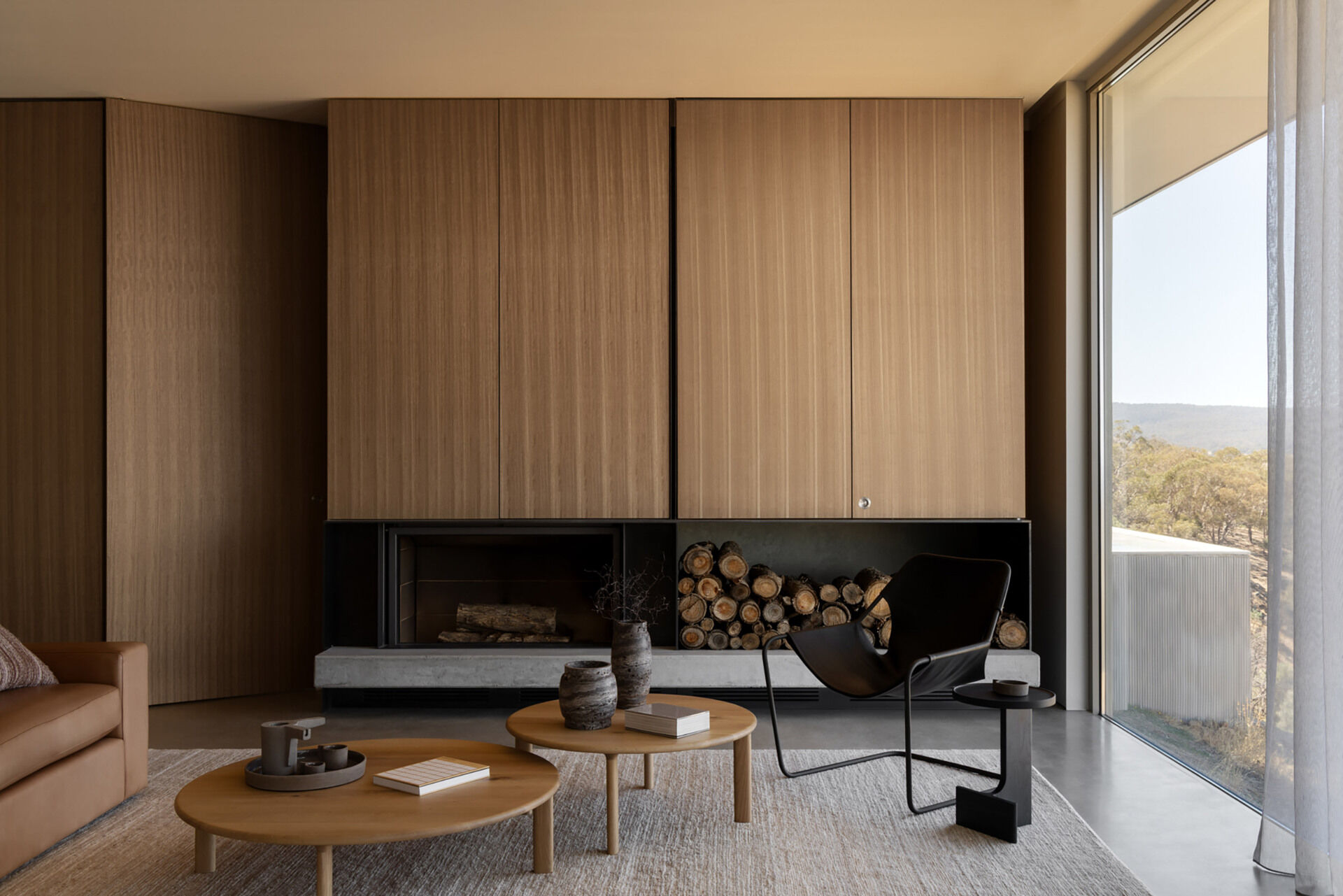 Floor-to-ceiling glazing and open-plan living spaces make the surrounding Victorian landscape a constant feature of everyday life.