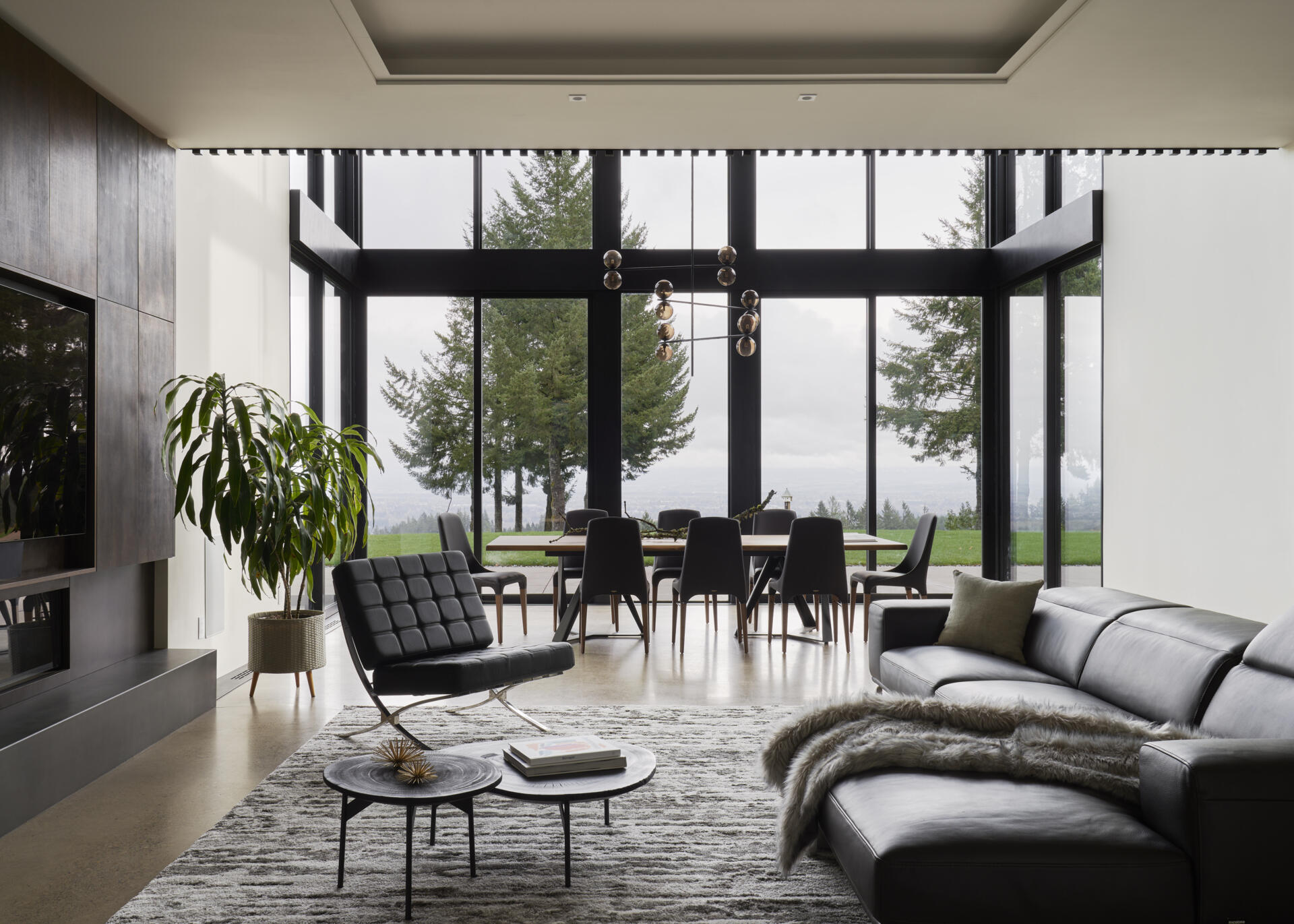 A modern dining room opens to a patio.