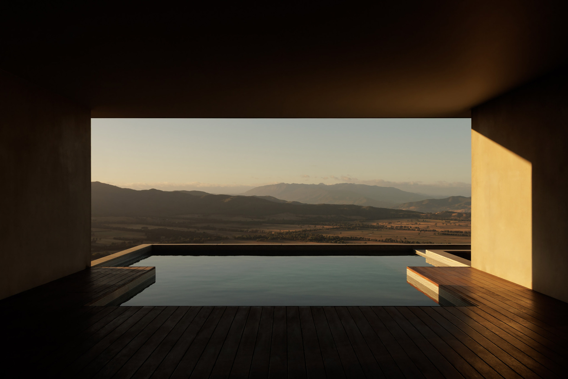 A horizon pool and spa appear to merge with the distant valleys, creating one of the most dramatic viewpoints in the entire home.
