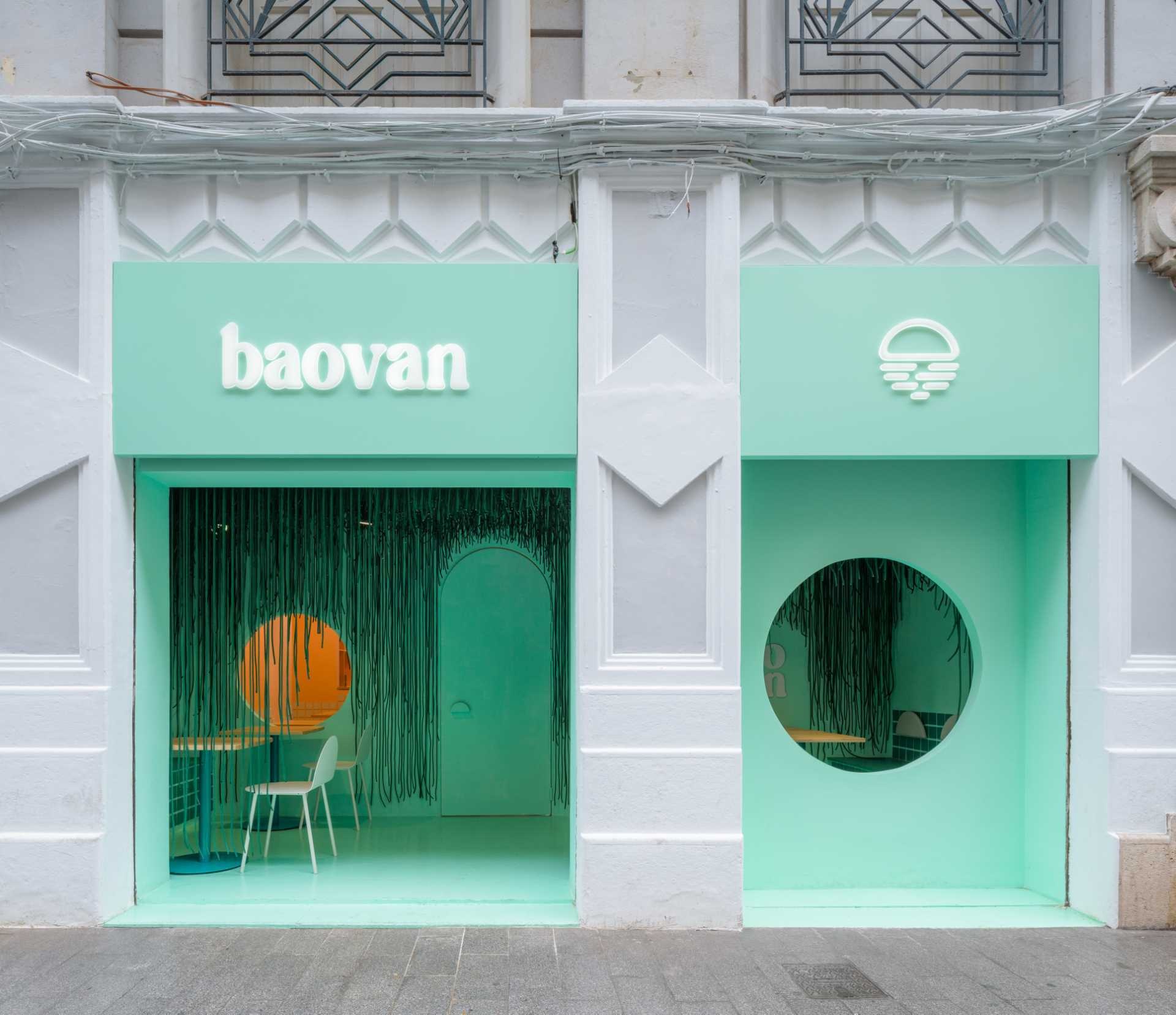 A light green facade and hundreds of hanging ropes create the first chapter of Baovan's immersive design story in Valencia. Designed by Clap Studio, the entrance transforms into a forest-like installation that draws visitors into the restaurant experience before they even step inside.
