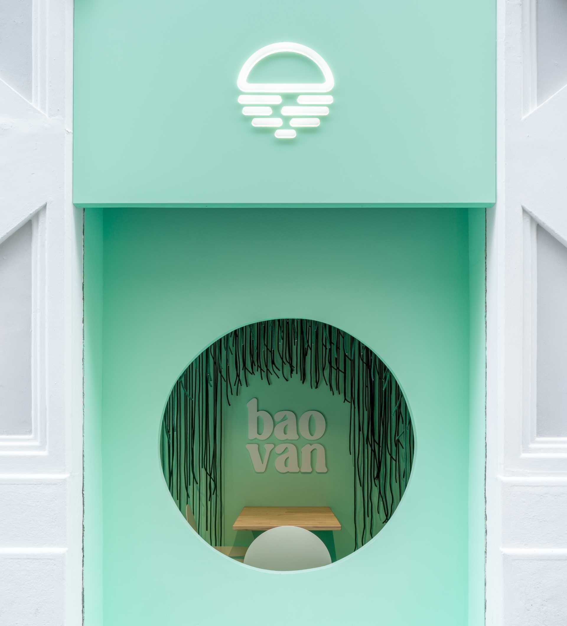 A light green facade and hundreds of hanging ropes create the first chapter of Baovan's immersive design story in Valencia. Designed by Clap Studio, the entrance transforms into a forest-like installation that draws visitors into the restaurant experience before they even step inside.