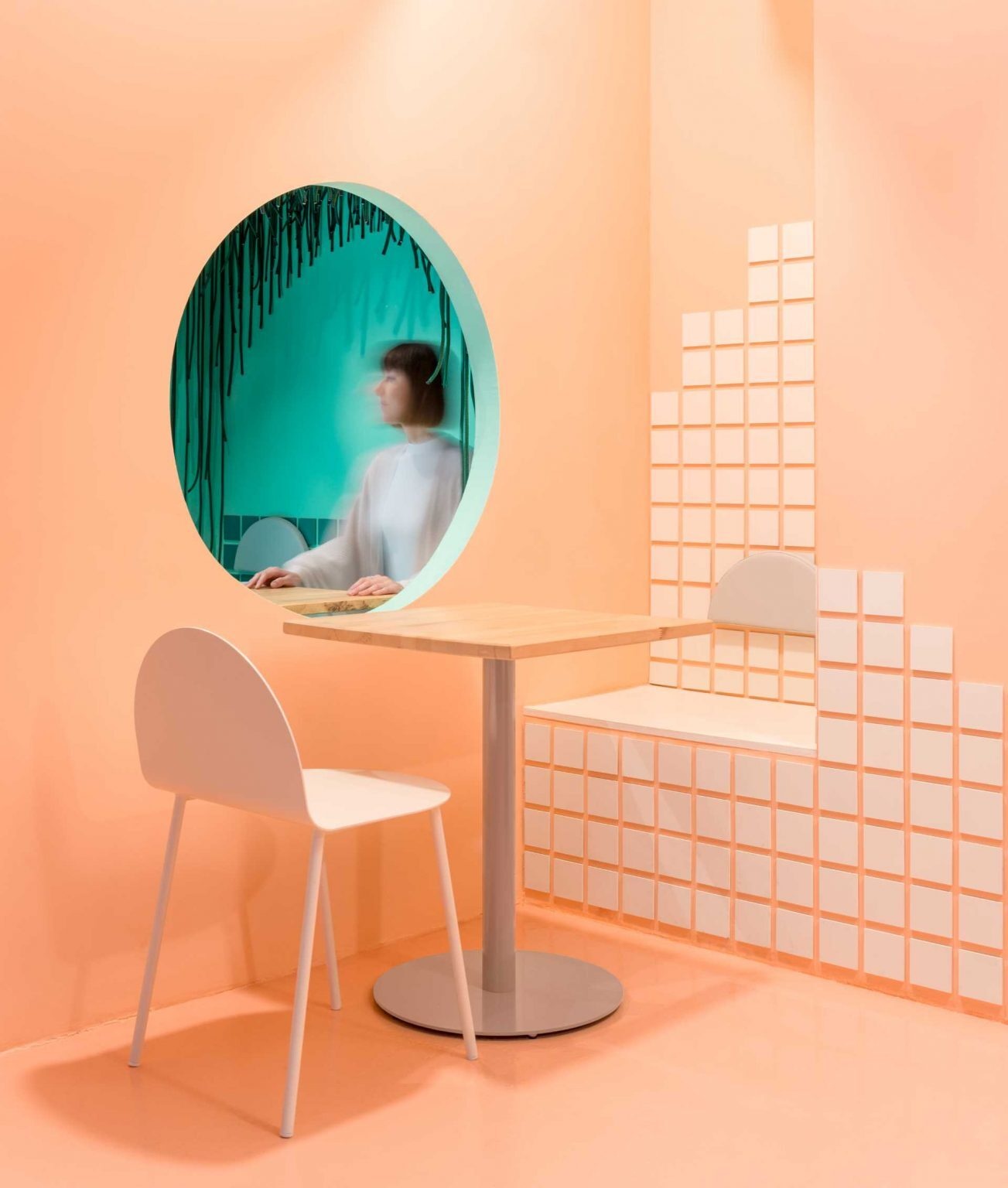 Sandy-toned walls and a ceiling inspired by drifting clouds give Baovan the atmosphere of a beach at sunset. The restaurant's interior uses color, texture, and light to create an immersive coastal experience in the heart of Valencia.