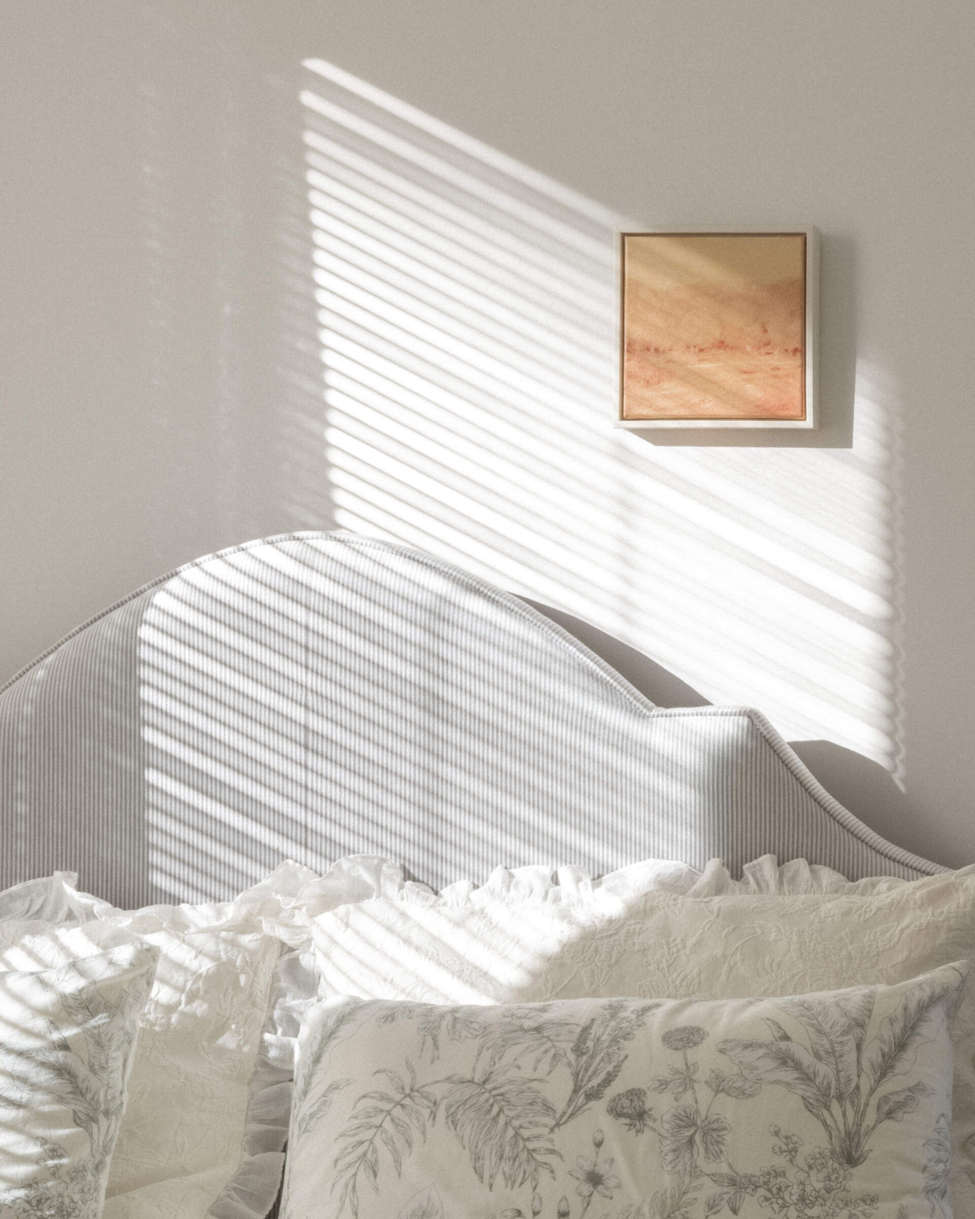 A calming bedroom designed with soft colors and natural light creates a peaceful space for rest and relaxation.
