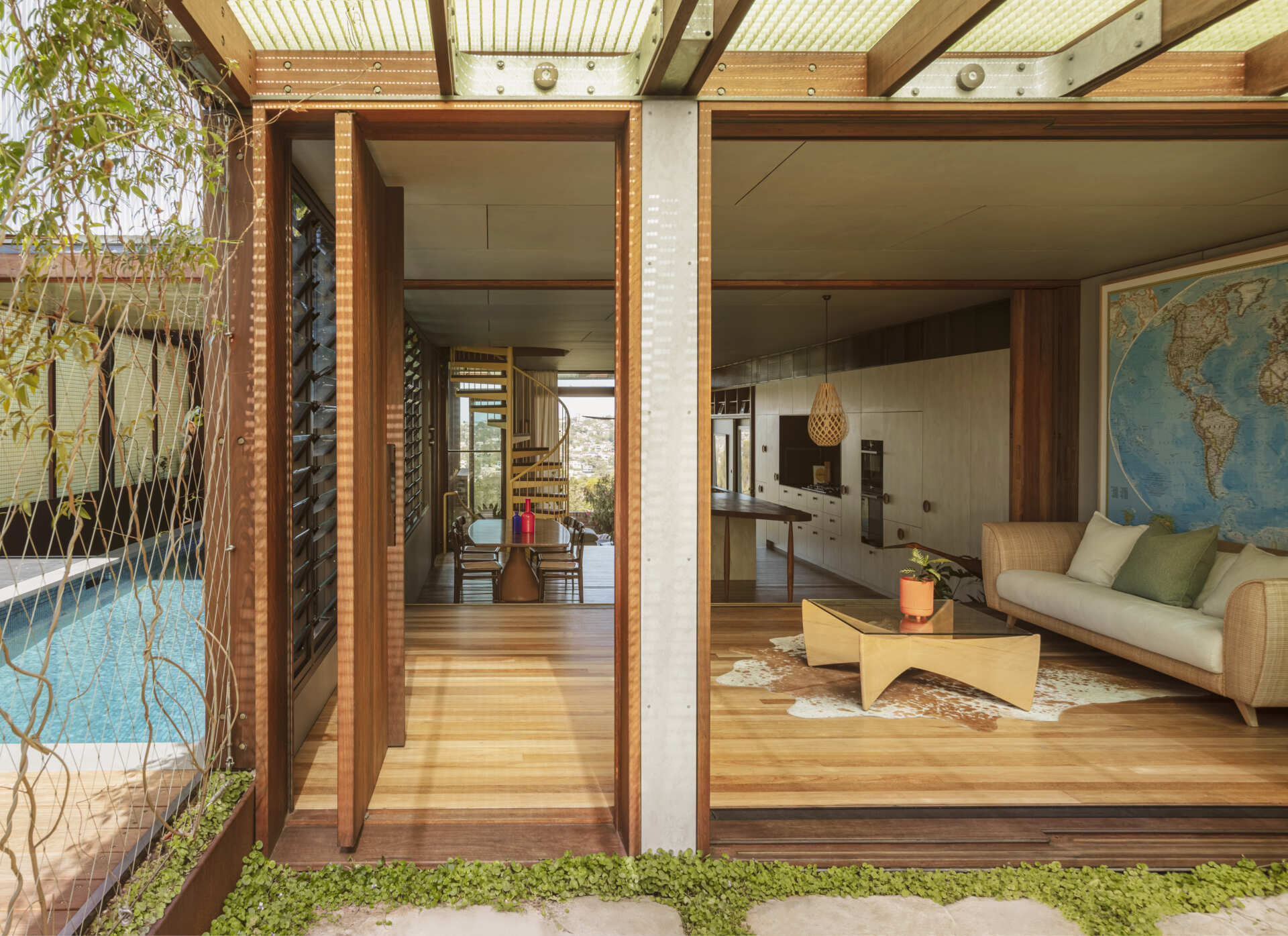 A breathtaking entry sequence where a raised lap pool, circular roof opening, and expansive views create an unforgettable first impression.