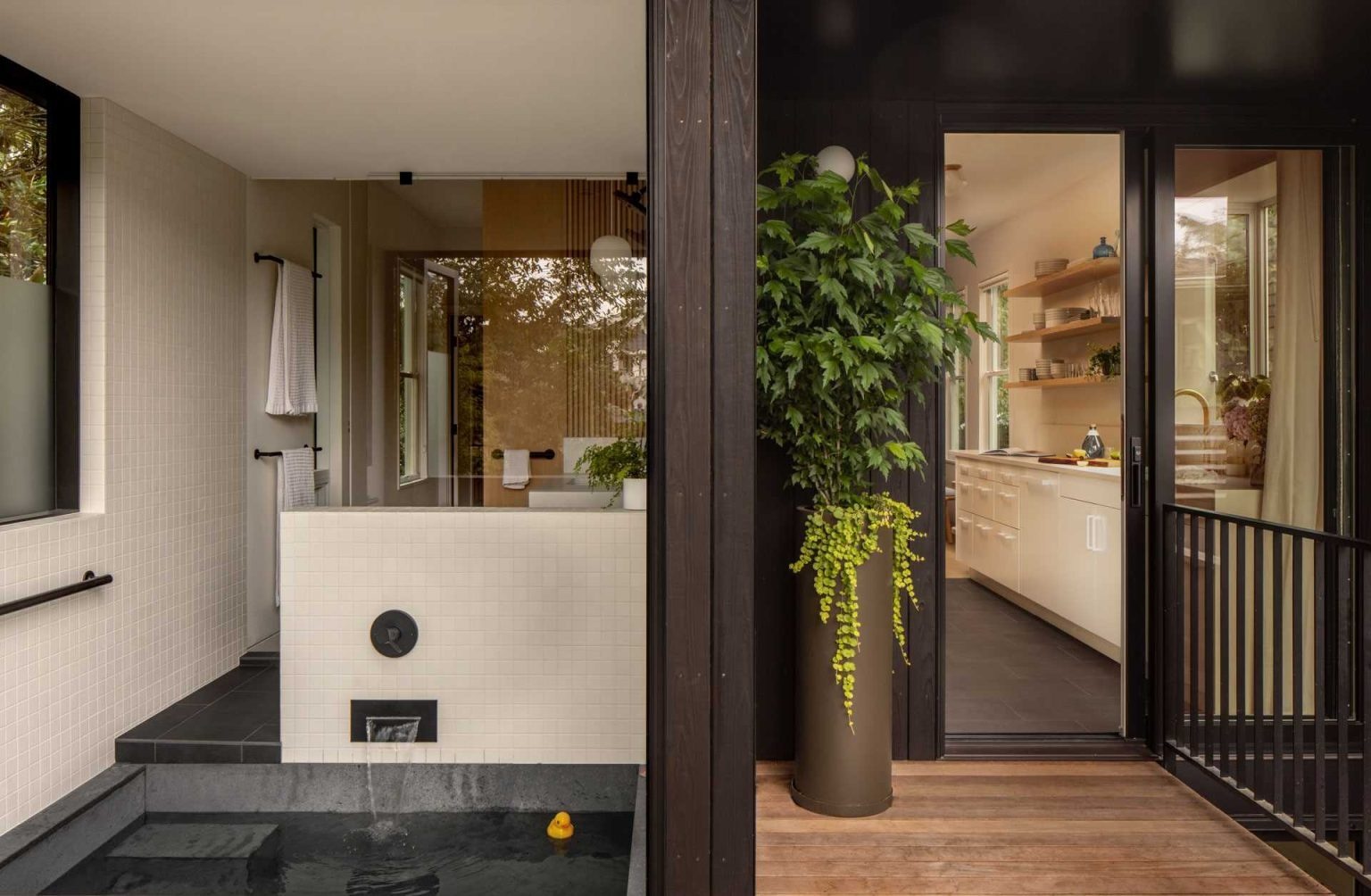 A 30-square-foot addition completely transforms this family bathroom with a traditional Japanese soaking tub and folding doors that open outdoors.