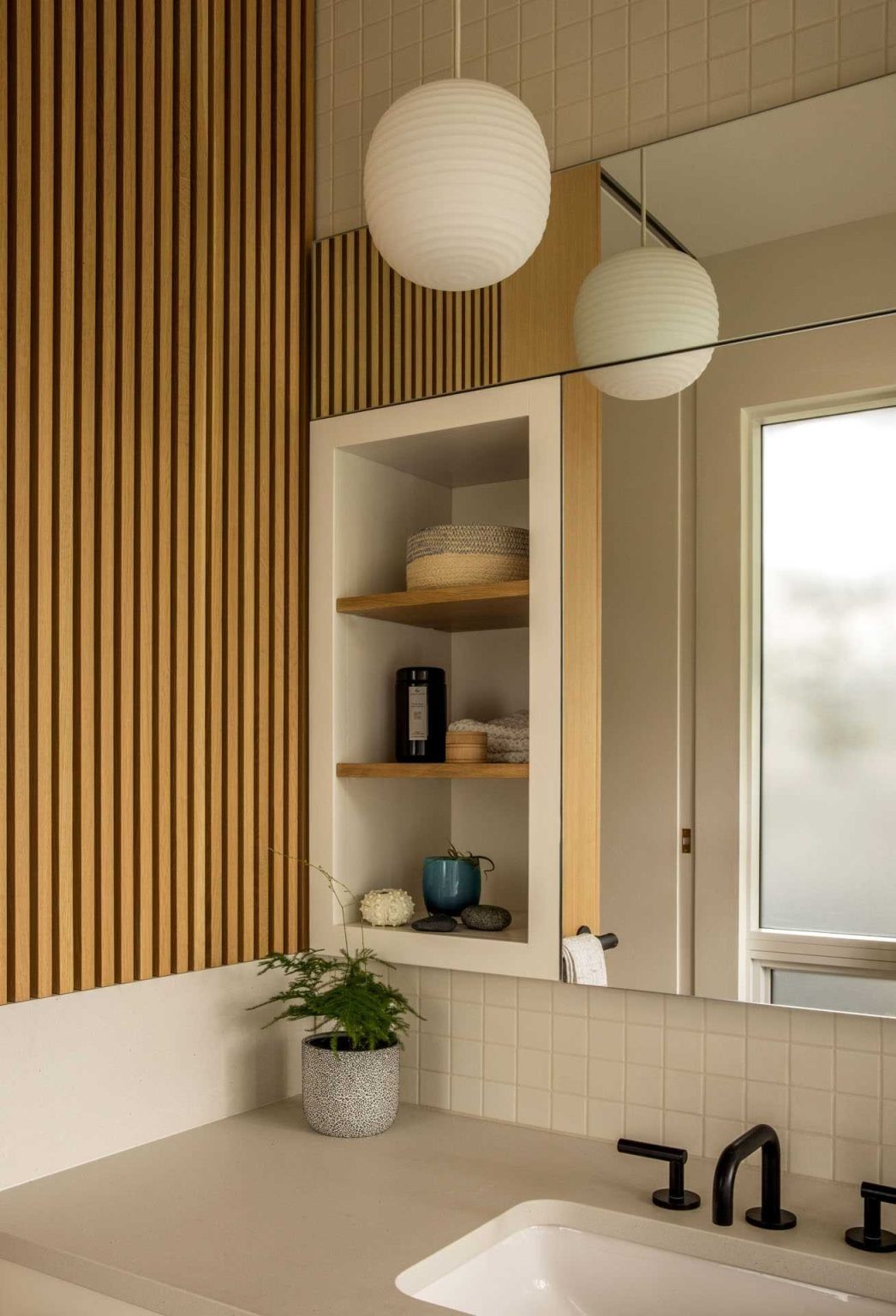 A 30-square-foot addition completely transforms this family bathroom with a traditional Japanese soaking tub and folding doors that open outdoors.
