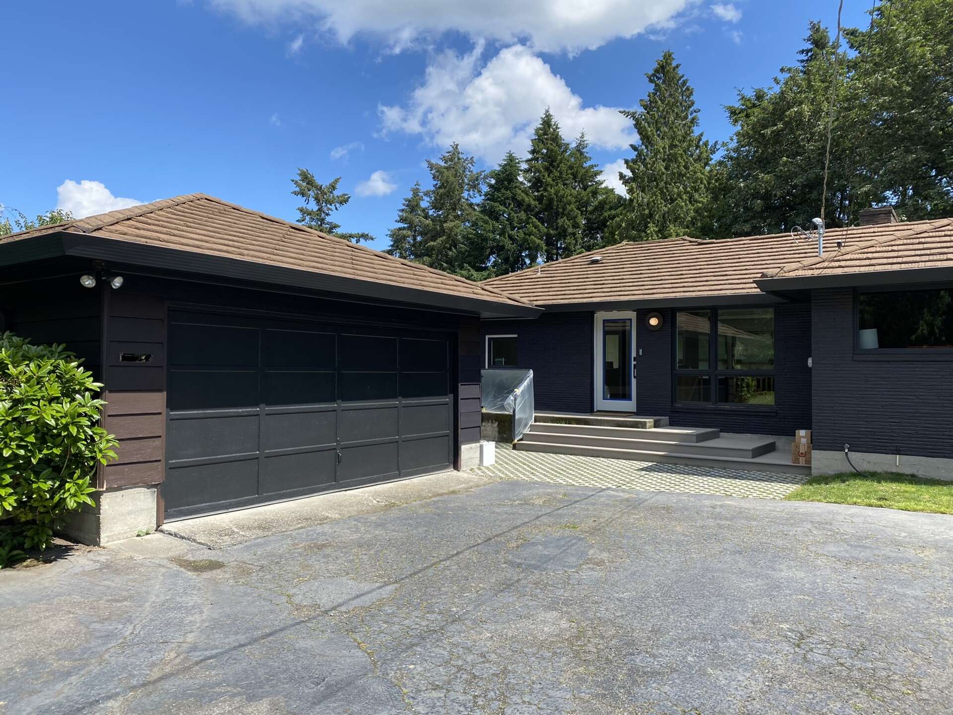 BEFORE - An aging garage in Seattle becomes the starting point for a creative architectural transformation that improves both function and curb appeal.