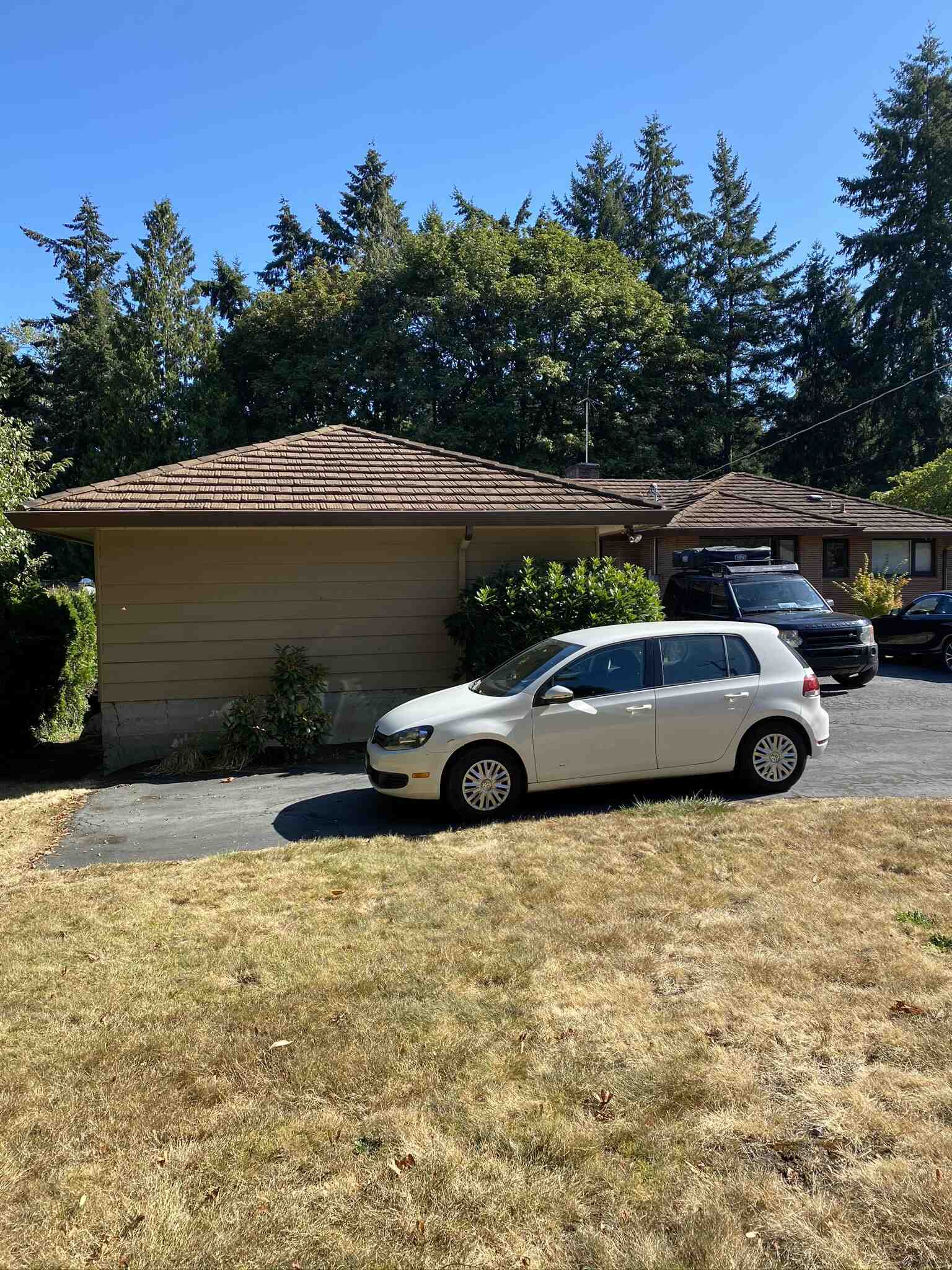 BEFORE - An aging garage in Seattle becomes the starting point for a creative architectural transformation that improves both function and curb appeal.