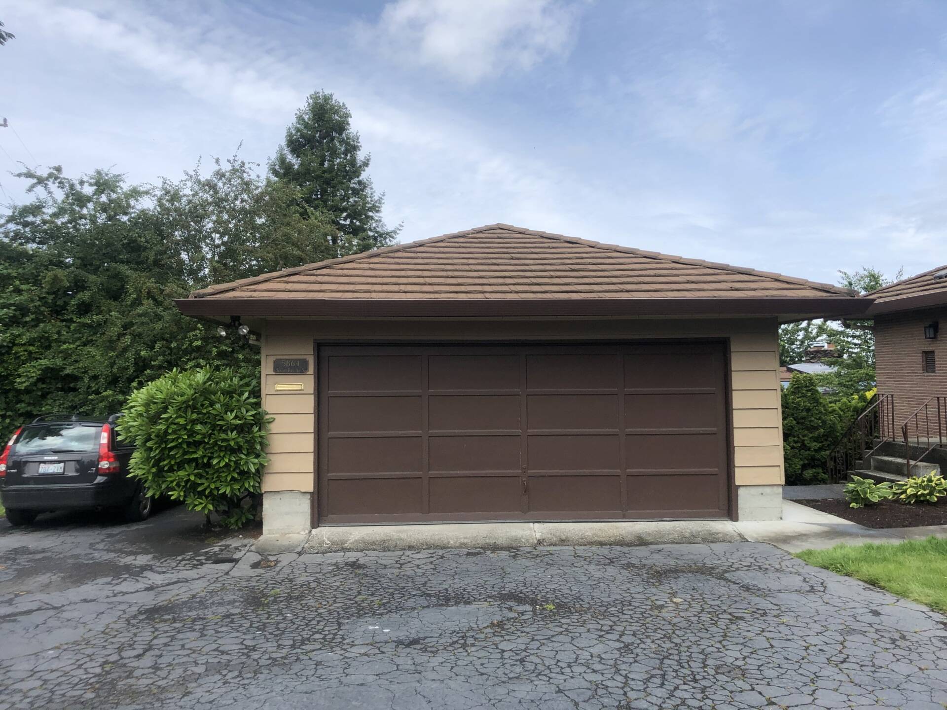 BEFORE - An aging garage in Seattle becomes the starting point for a creative architectural transformation that improves both function and curb appeal.