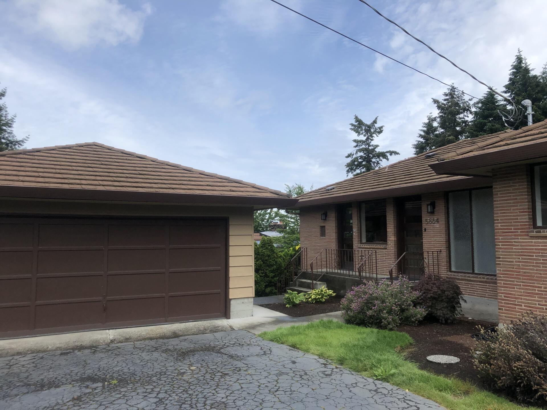 BEFORE - An aging garage in Seattle becomes the starting point for a creative architectural transformation that improves both function and curb appeal.