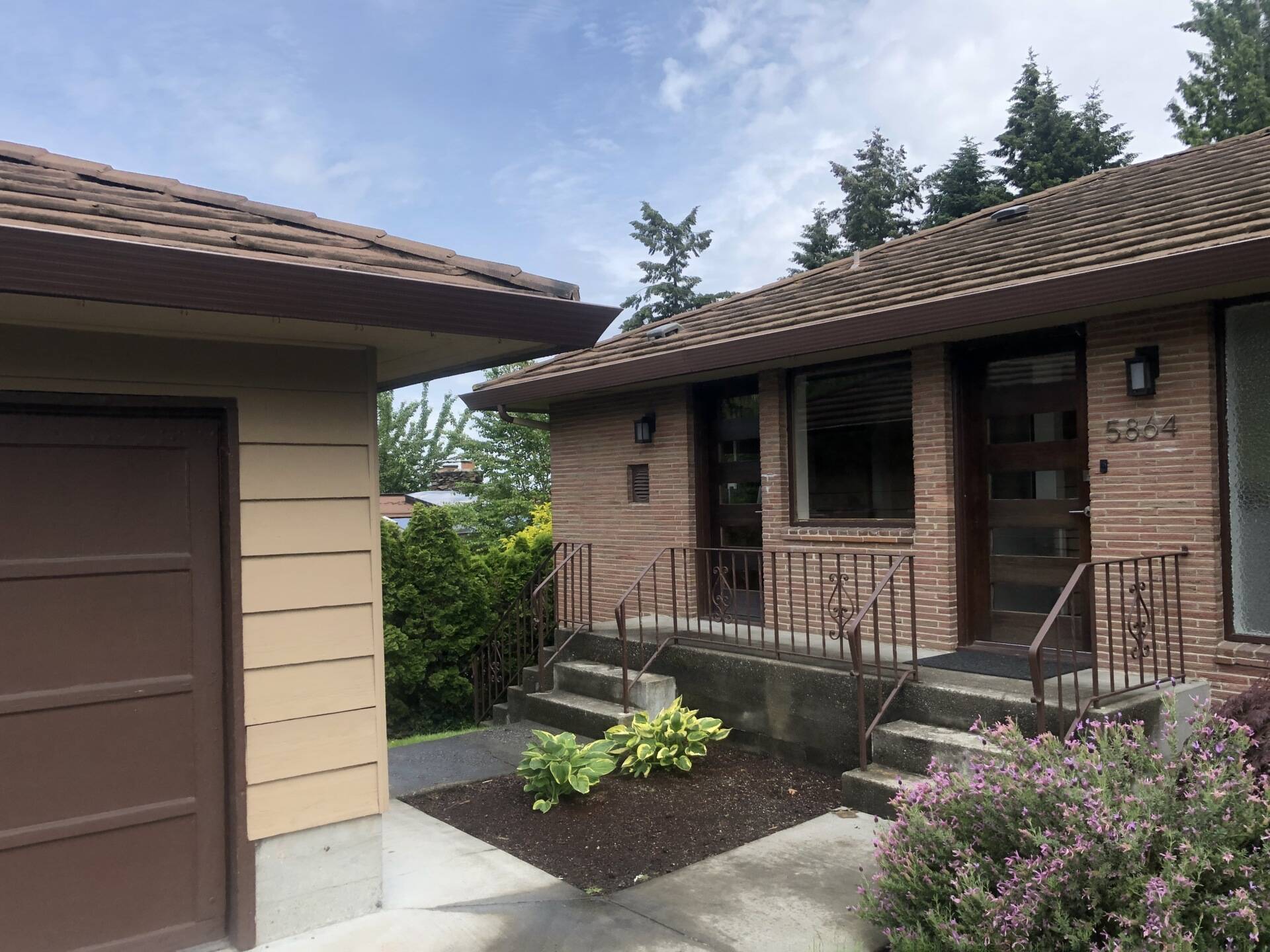 BEFORE - An aging garage in Seattle becomes the starting point for a creative architectural transformation that improves both function and curb appeal.
