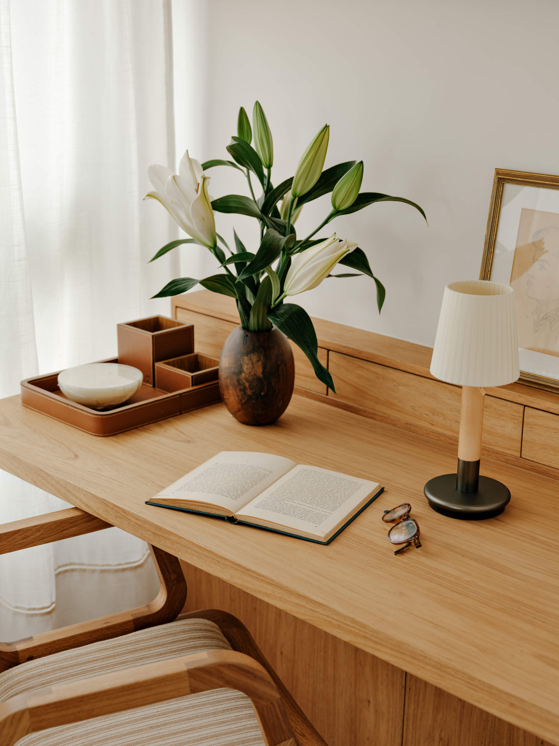 This built-in bedroom office combines floating shelves, timber joinery and smart storage in a beautifully compact layout.
