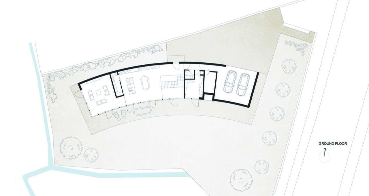 Explore the floor plans behind this remarkable curved house and discover how one continuous form shapes every room, outdoor space, and circulation path.