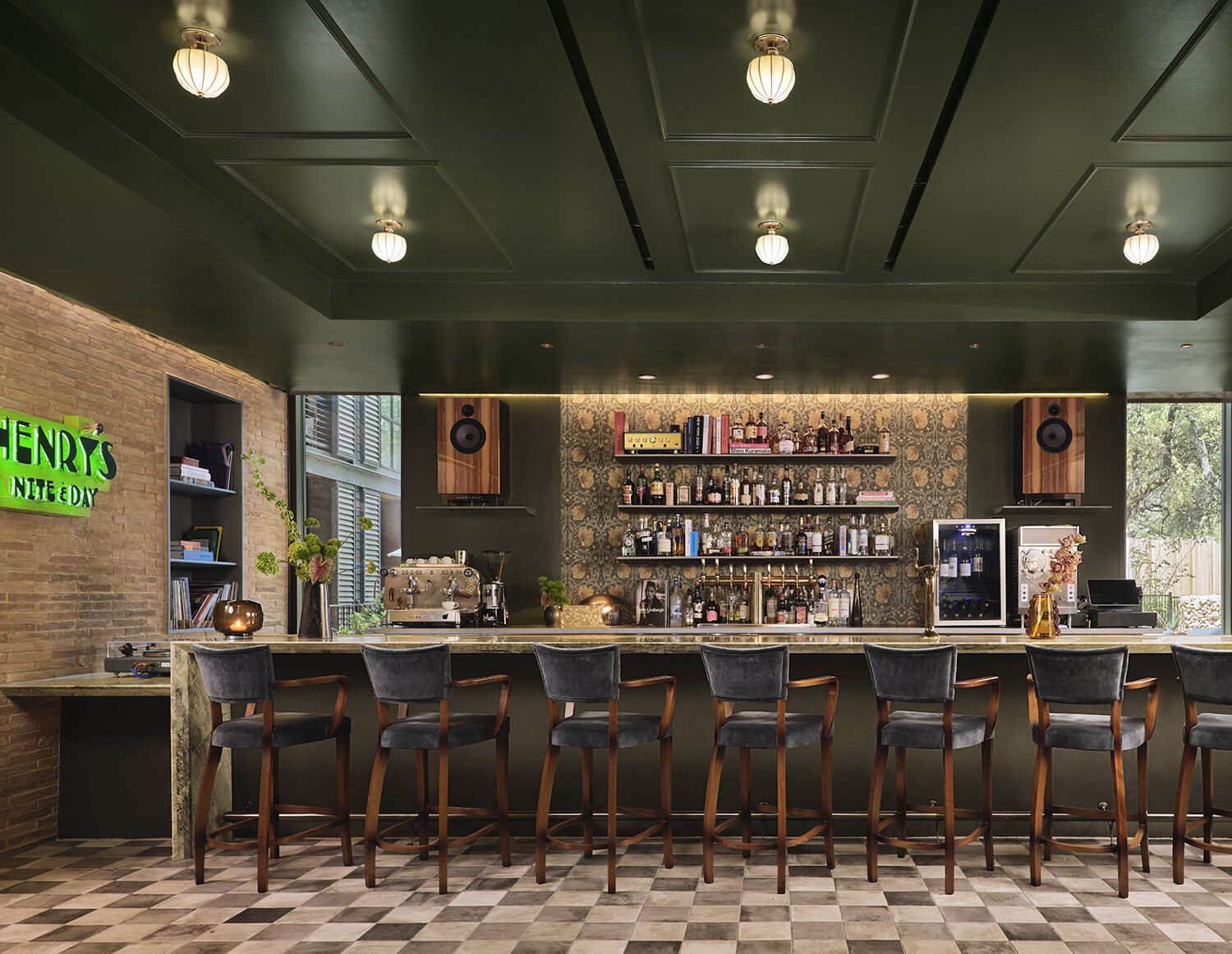 Step inside Henry's, the stylish restaurant and bar at The Inn at Green Pastures, where classic details meet contemporary hospitality.