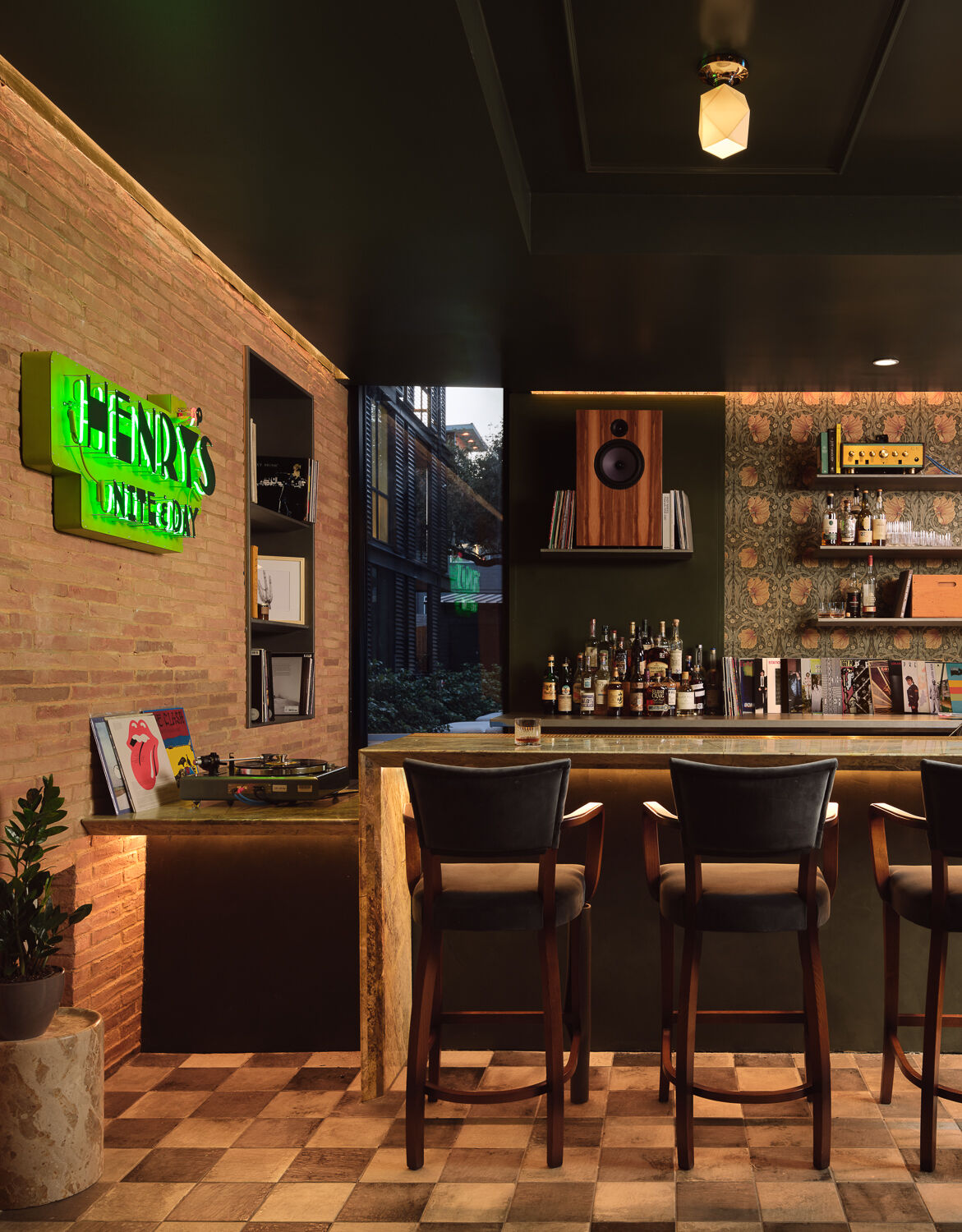 Step inside Henry's, the stylish restaurant and bar at The Inn at Green Pastures, where classic details meet contemporary hospitality.