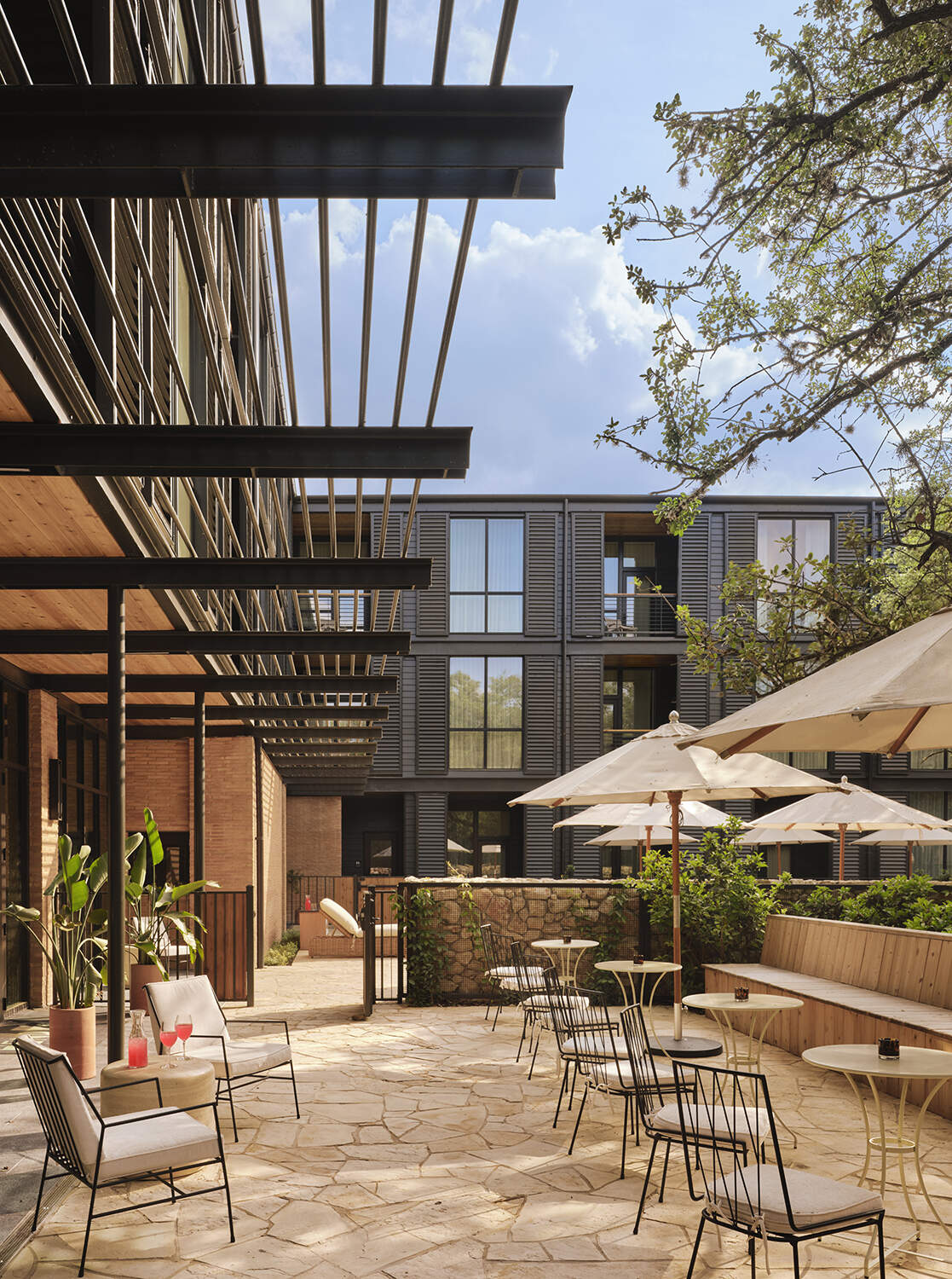 Take a closer look at how architecture and mature oak trees work together to shape one of Austin's newest boutique hotels.