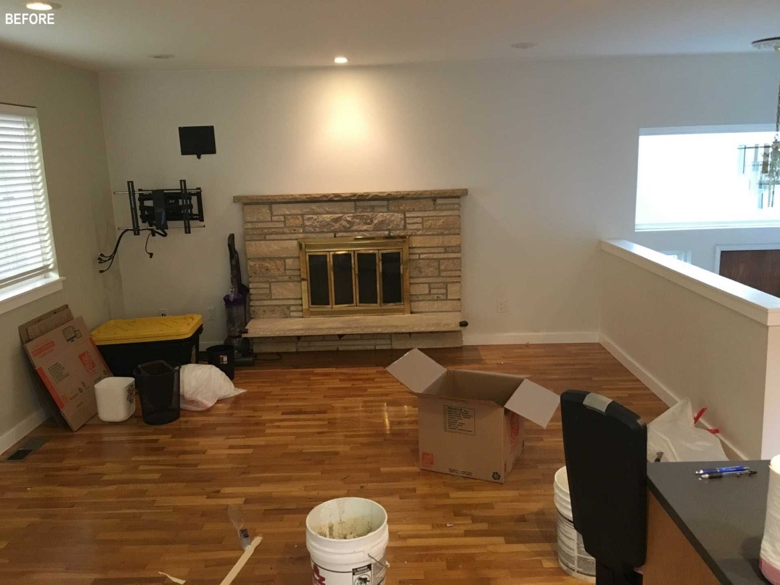 BEFORE - Removing walls created one spacious living, dining, and kitchen area that feels brighter, more open, and better suited to family living.