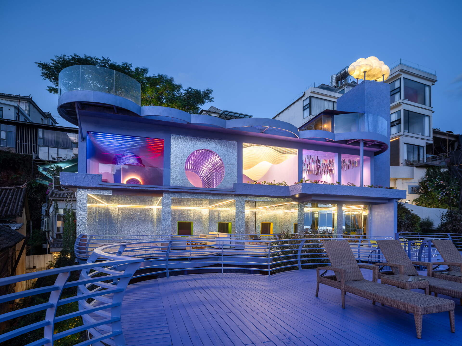 Cloud-inspired violet forms, colorful terraces and surreal design ideas come together at Manwu Jimu Guesthouse, where architecture and landscape create an unforgettable experience.