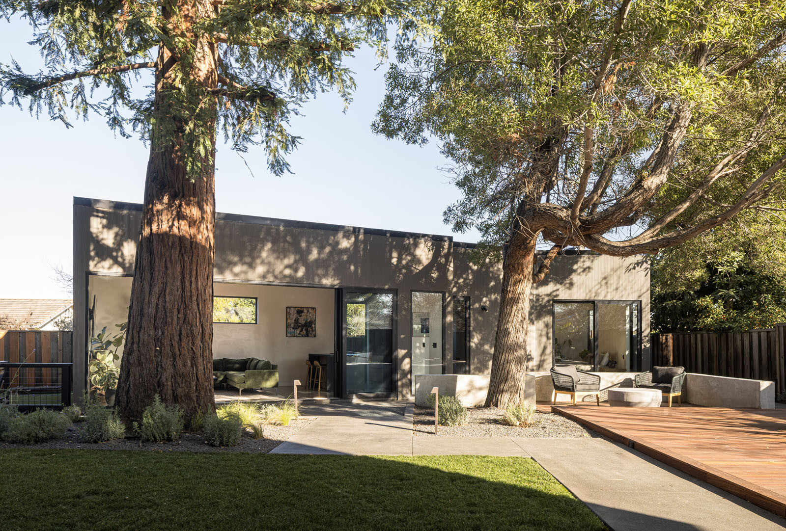The home includes two additional living spaces that make it easy to accommodate changing family needs. A junior accessory dwelling unit provides room for extended family, while a detached accessory dwelling unit offers even more flexibility.