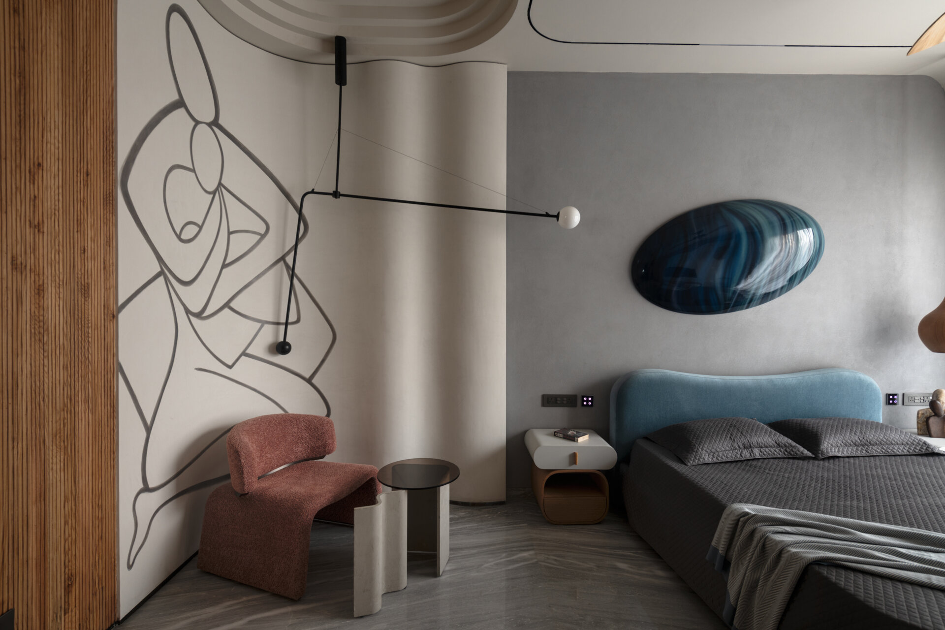 Neutral colours, bespoke furniture and soft textures create peaceful bedroom interiors in this luxury Delhi home.