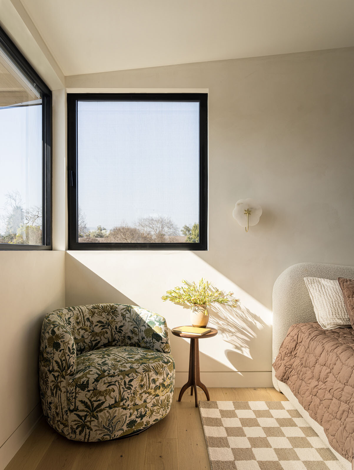 A playful girls' bedroom and bathroom finished with pink Portuguese marble adds a fun surprise inside this warm and modern Silicon Valley home.