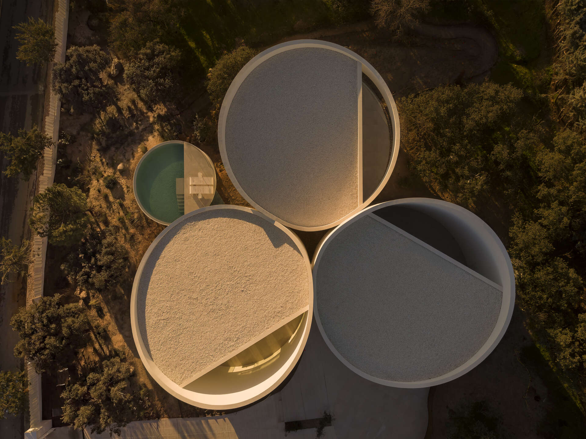 Explore how five curved volumes and an unusual floor plan combine to create one of Madrid's most distinctive contemporary homes.
