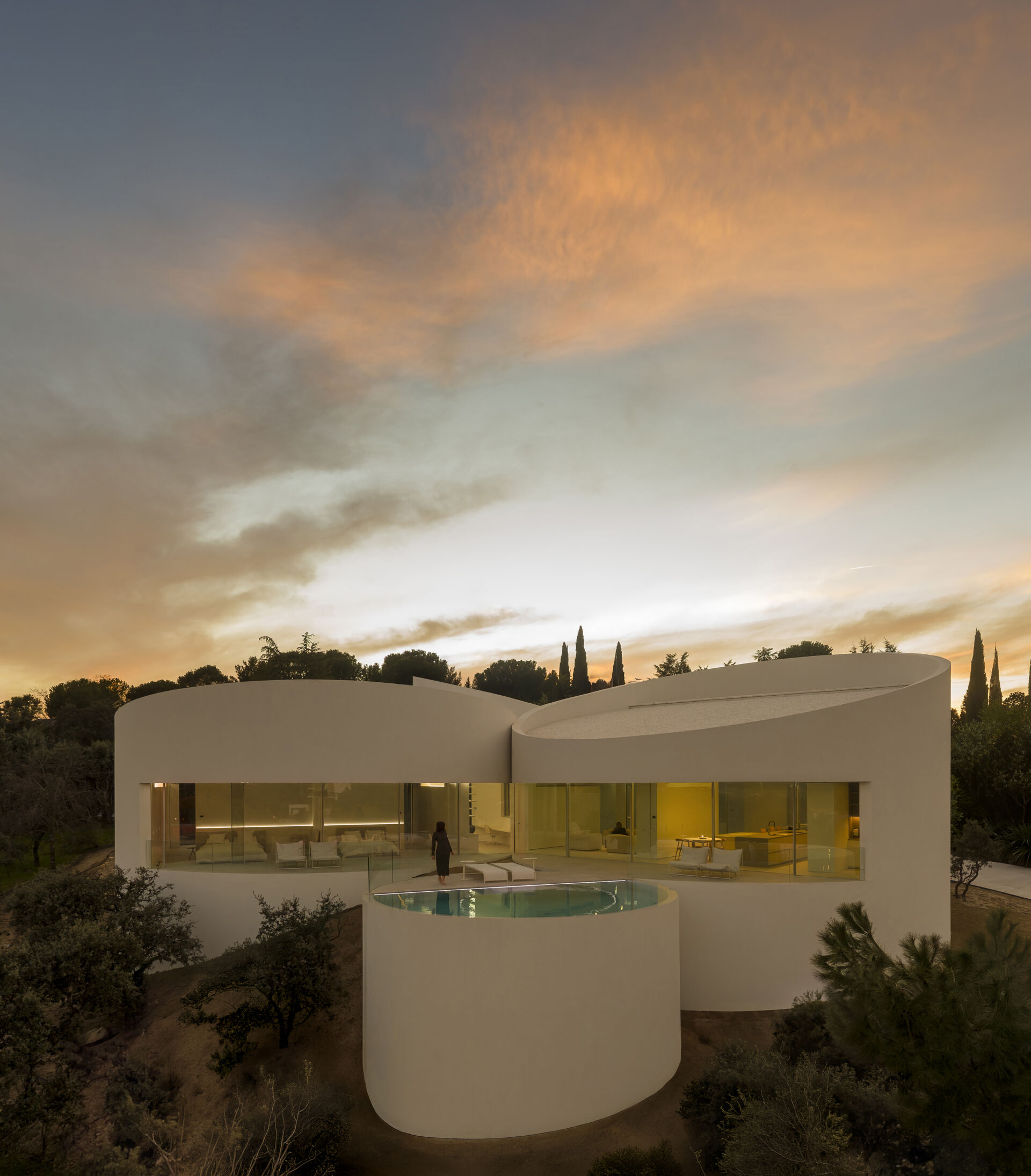 Explore how five curved volumes and an unusual floor plan combine to create one of Madrid's most distinctive contemporary homes.