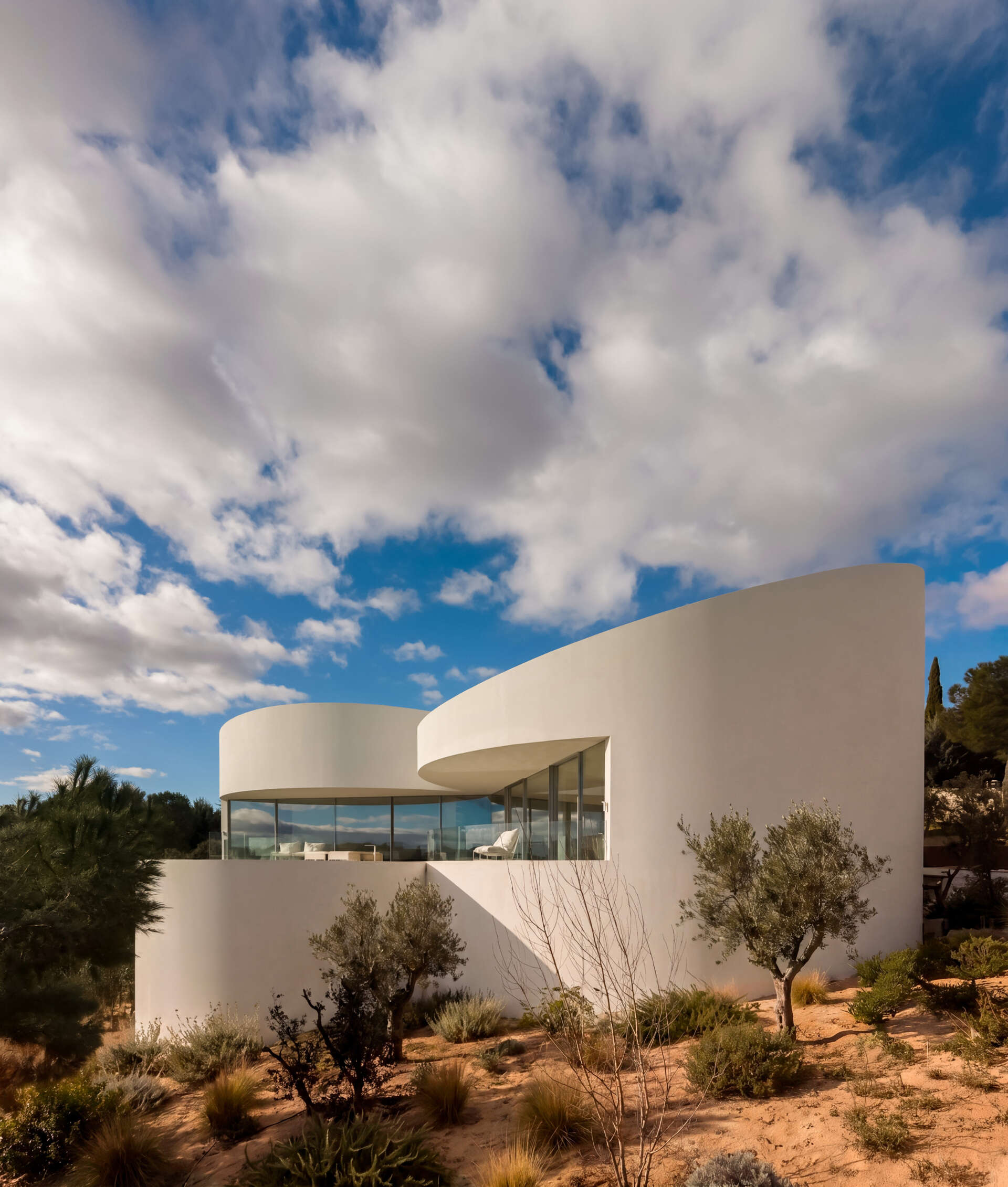 Explore how five curved volumes and an unusual floor plan combine to create one of Madrid's most distinctive contemporary homes.